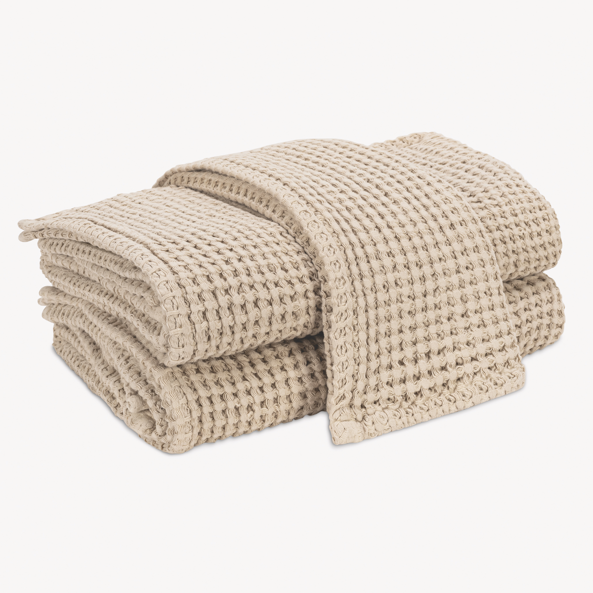 Folded Matouk Nico Bath Towels in Dune color