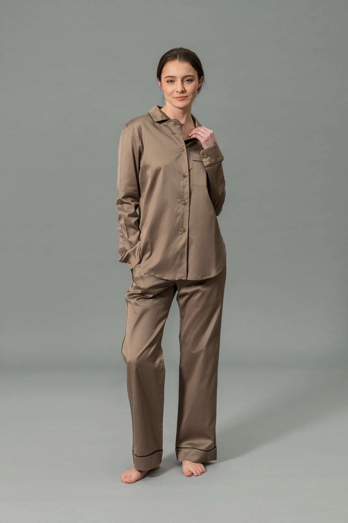 Front View of Model Wearing Matouk Nocturne Pajama Set in Color Mocha and Sable