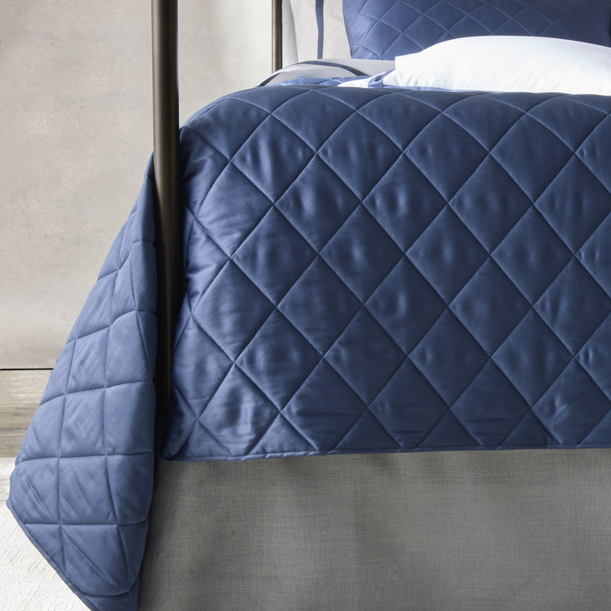 Closeup Shot of Matouk Nocturne Quilted Bedding at the Front of Bed