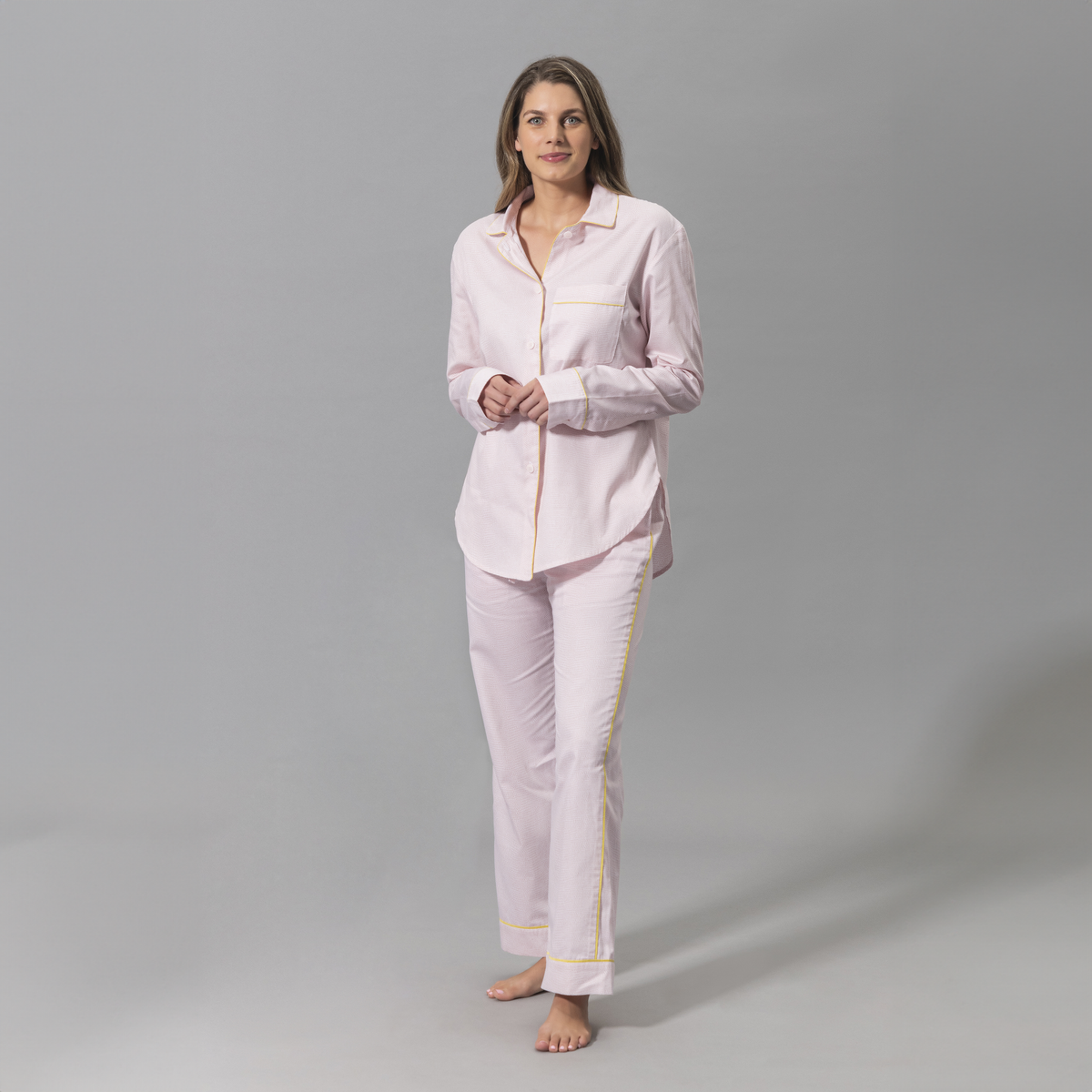 Woman Wearing a Matouk Jasper Pajama Set in Peony and Lemon Color