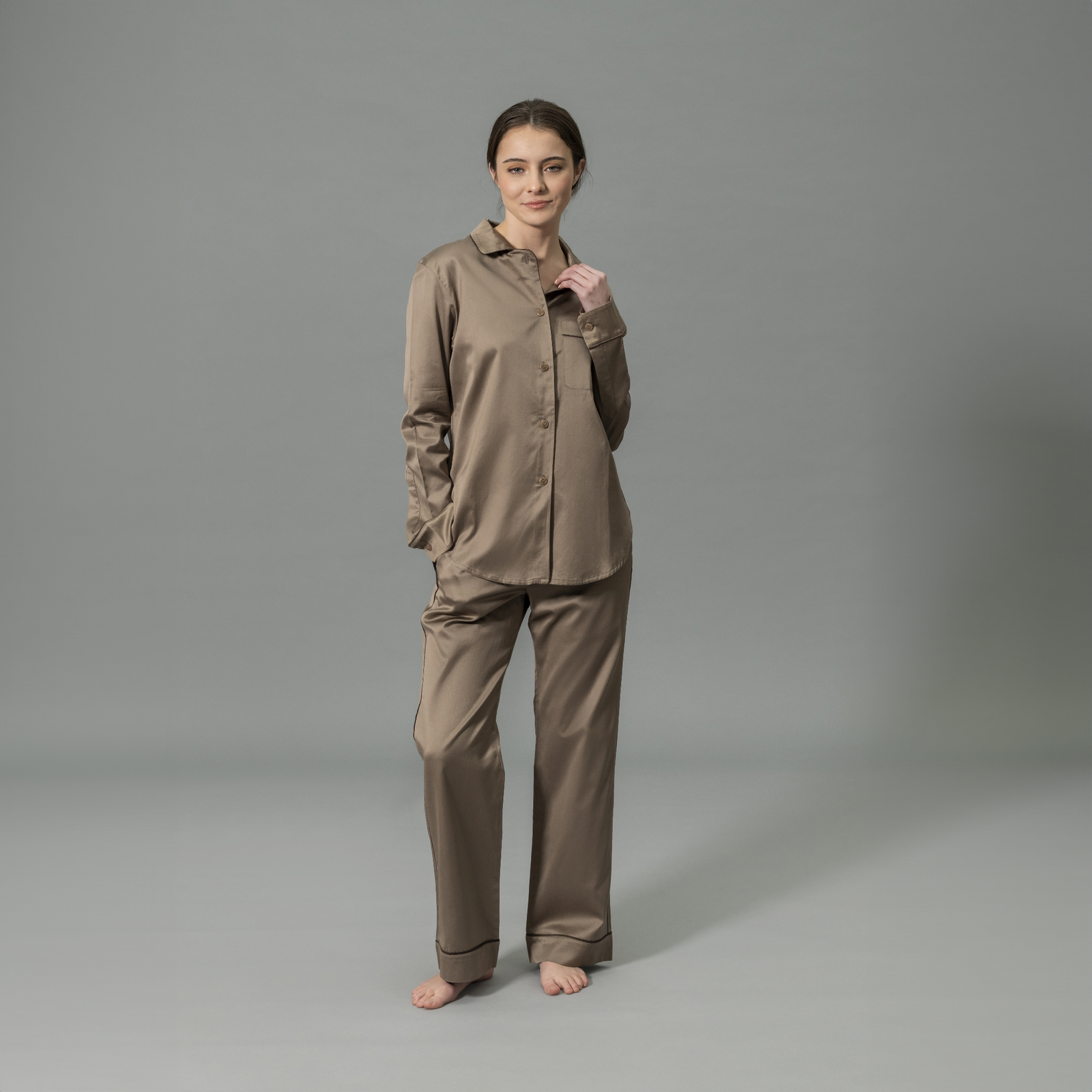 Front View of Model Wearing Matouk Nocturne Pajama Set in Color Mocha and Sable