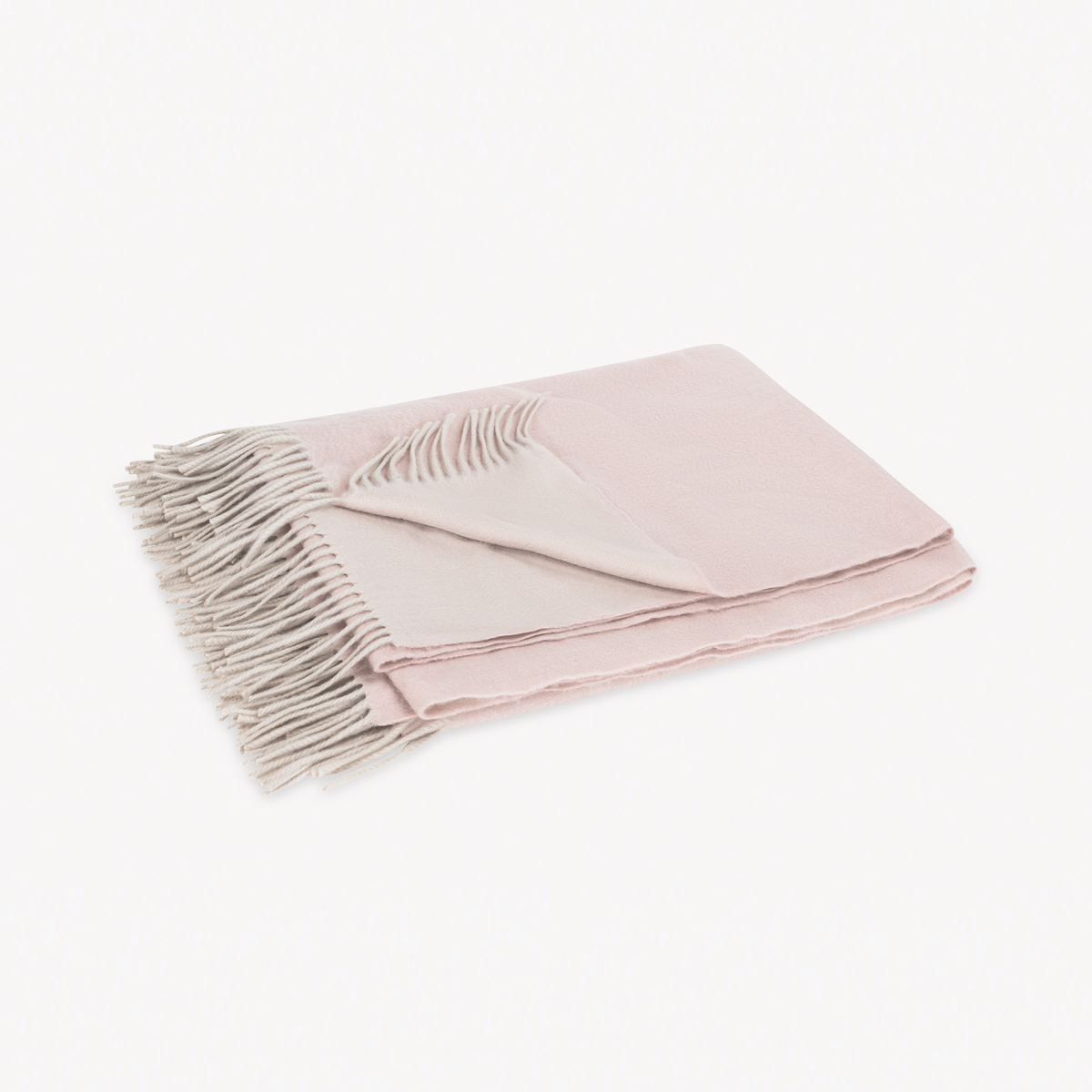 Folded Matouk Paley Throw in Ballet and Oyster Colors