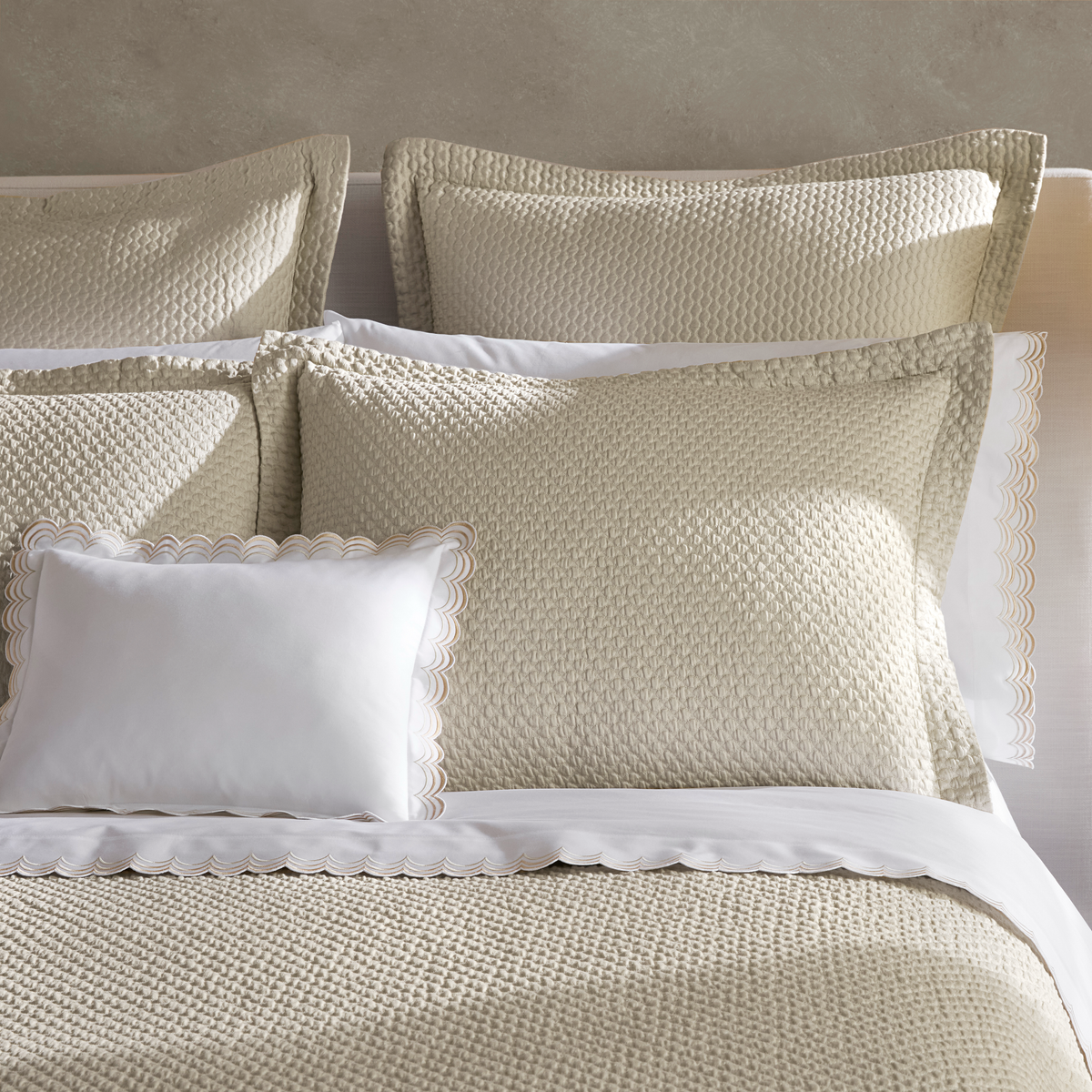 Close-up view of Almond Matouk Perla Bedding