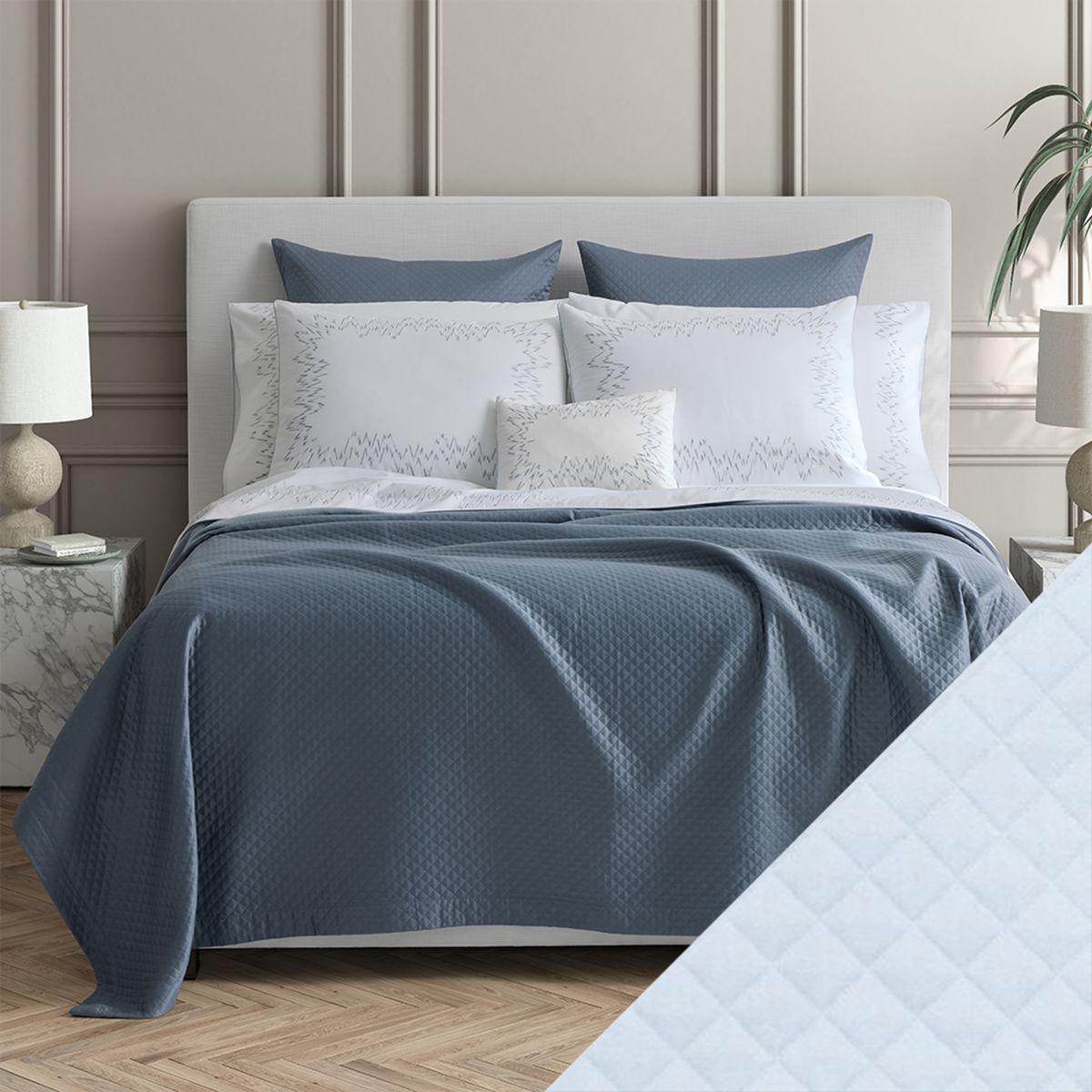 Bed Dressed in Matouk Petra Bedding with Swatch in Color Light Blue