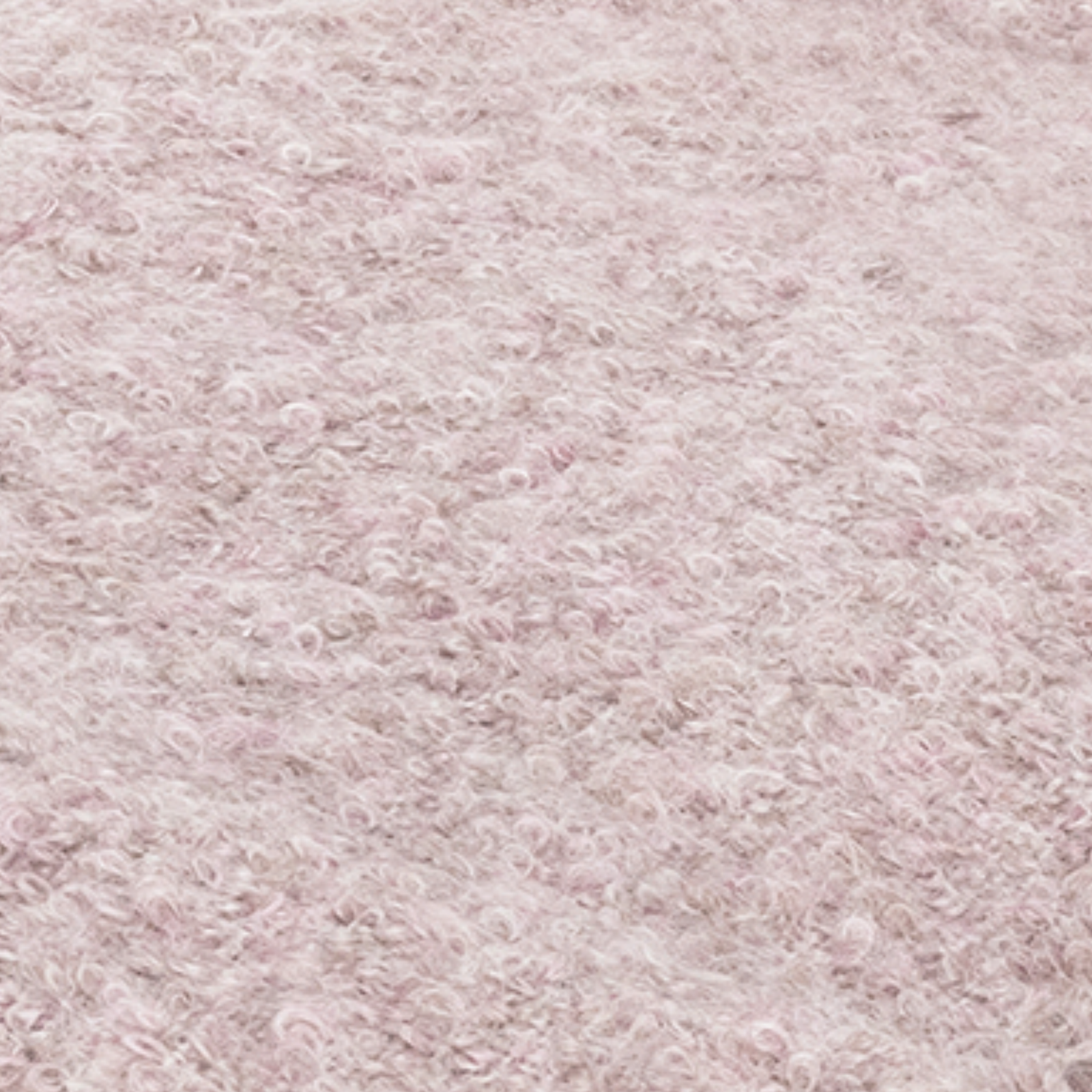 Stack of Matouk Poncho Throws in All Colors