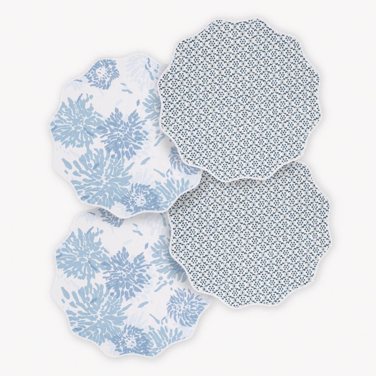 Matouk Reversible Placemat Collection in Chrysanthemum Blue and Laksha Indigo colors