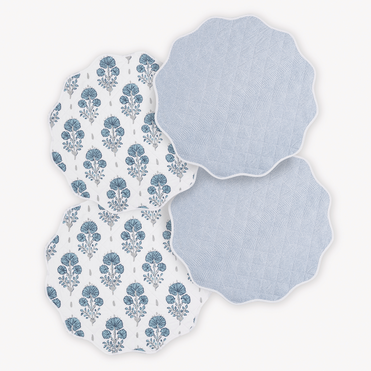Matouk Reversible Placemat Collection in Joplin Mineral Blue and Jasper Hazy Blue colors