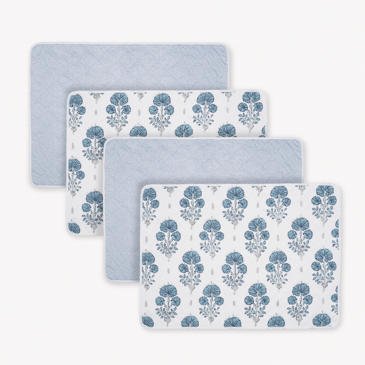 Pack of 4 Oblong Matouk Reversible Placemat Collection in Joplin Mineral Blue and Jasper Hazy Blue colors