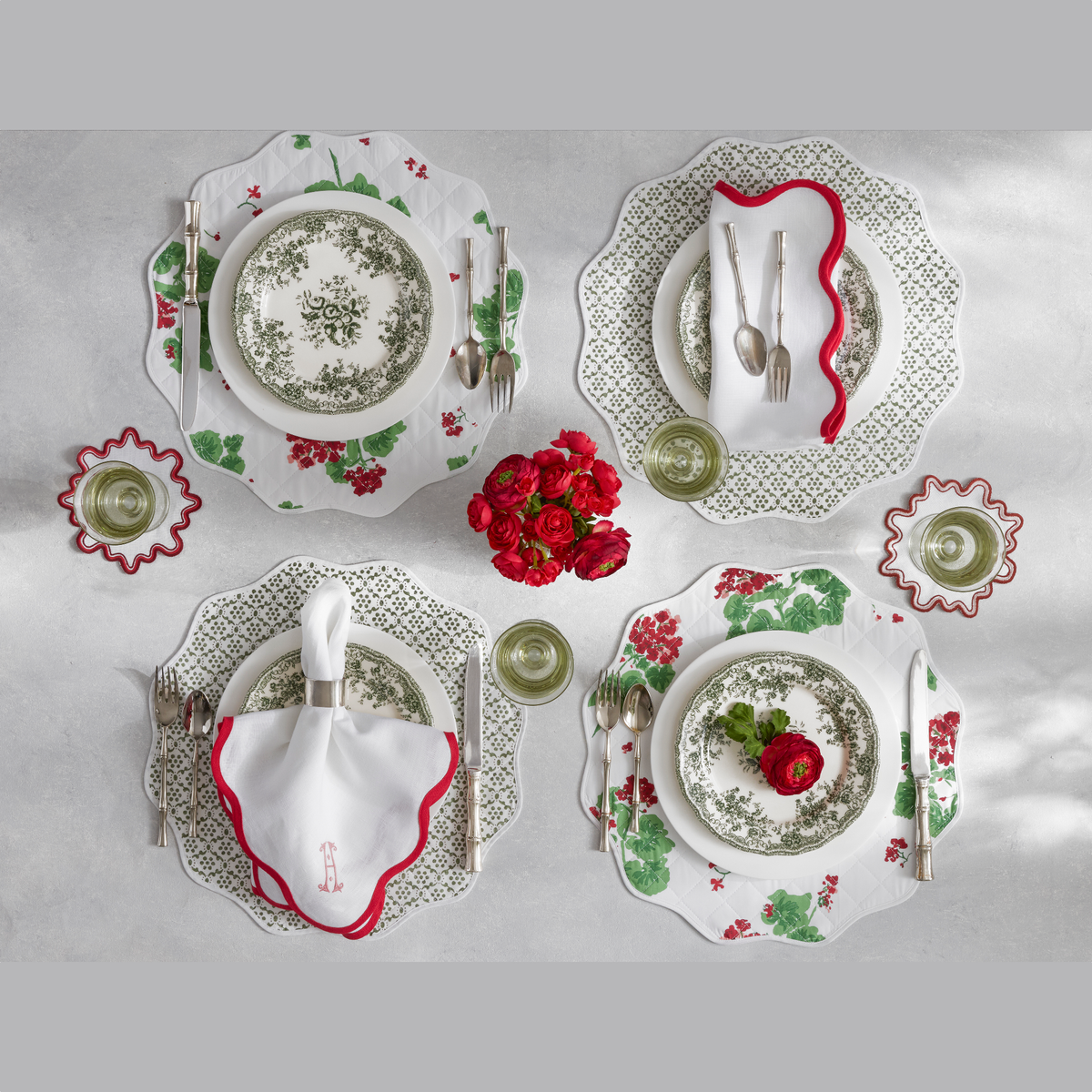 Reversible Quilted Placemat in Geranium Scarlet/Laksha Moss shown with Scallop Edge in Scarlet