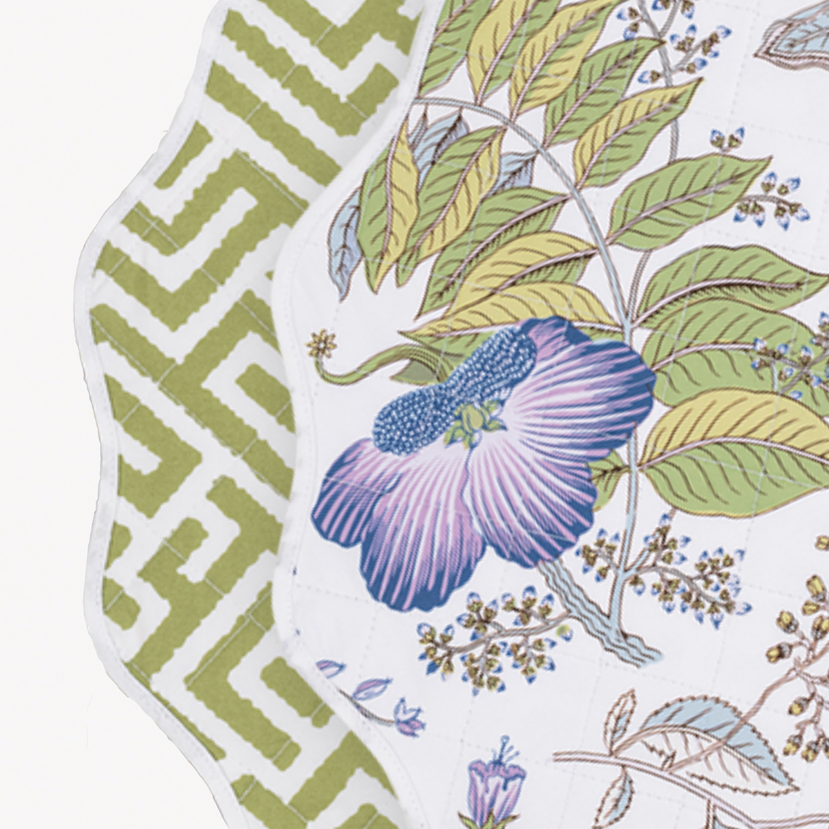 Closeup of Matouk Reversible Placemat Collection in Pomegranate Lilac and Gabriel Grass colors