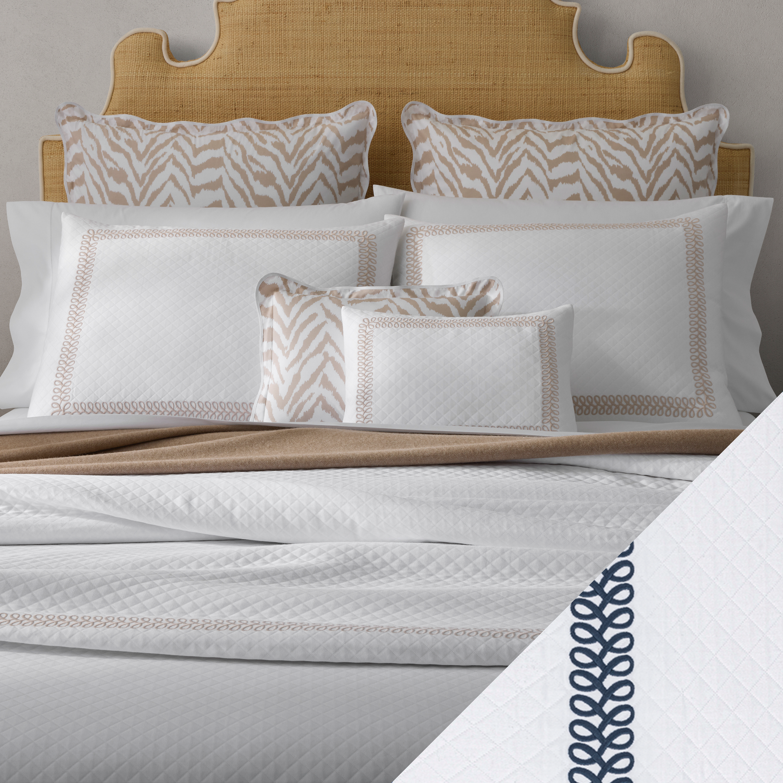 Full Bed Dressed in Matouk Schumacher Astor Braid Matelassé Bedding with Indigo Swatch