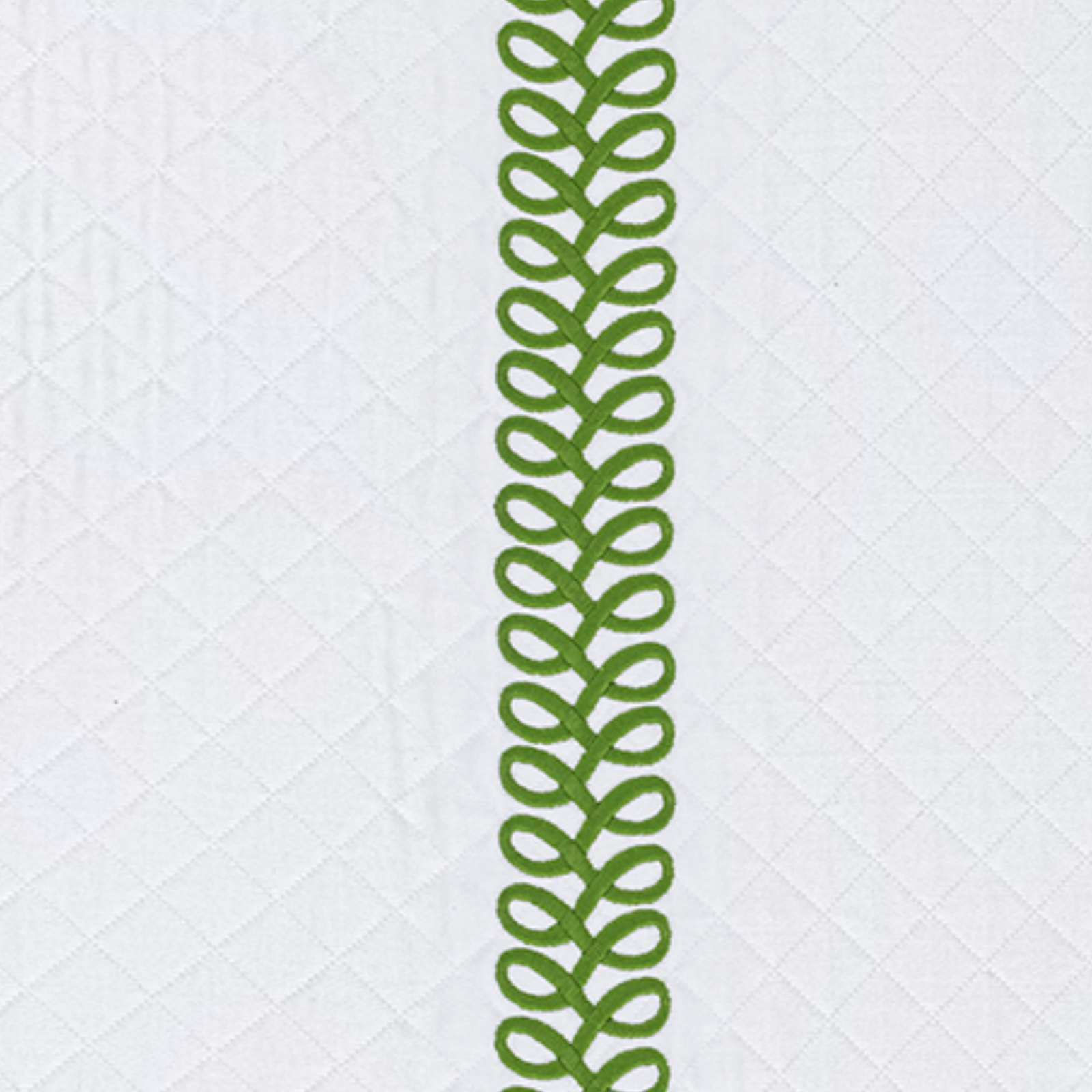 Full Bed Dressed in Matouk Schumacher Astor Braid Matelassé Bedding with Grass Swatch