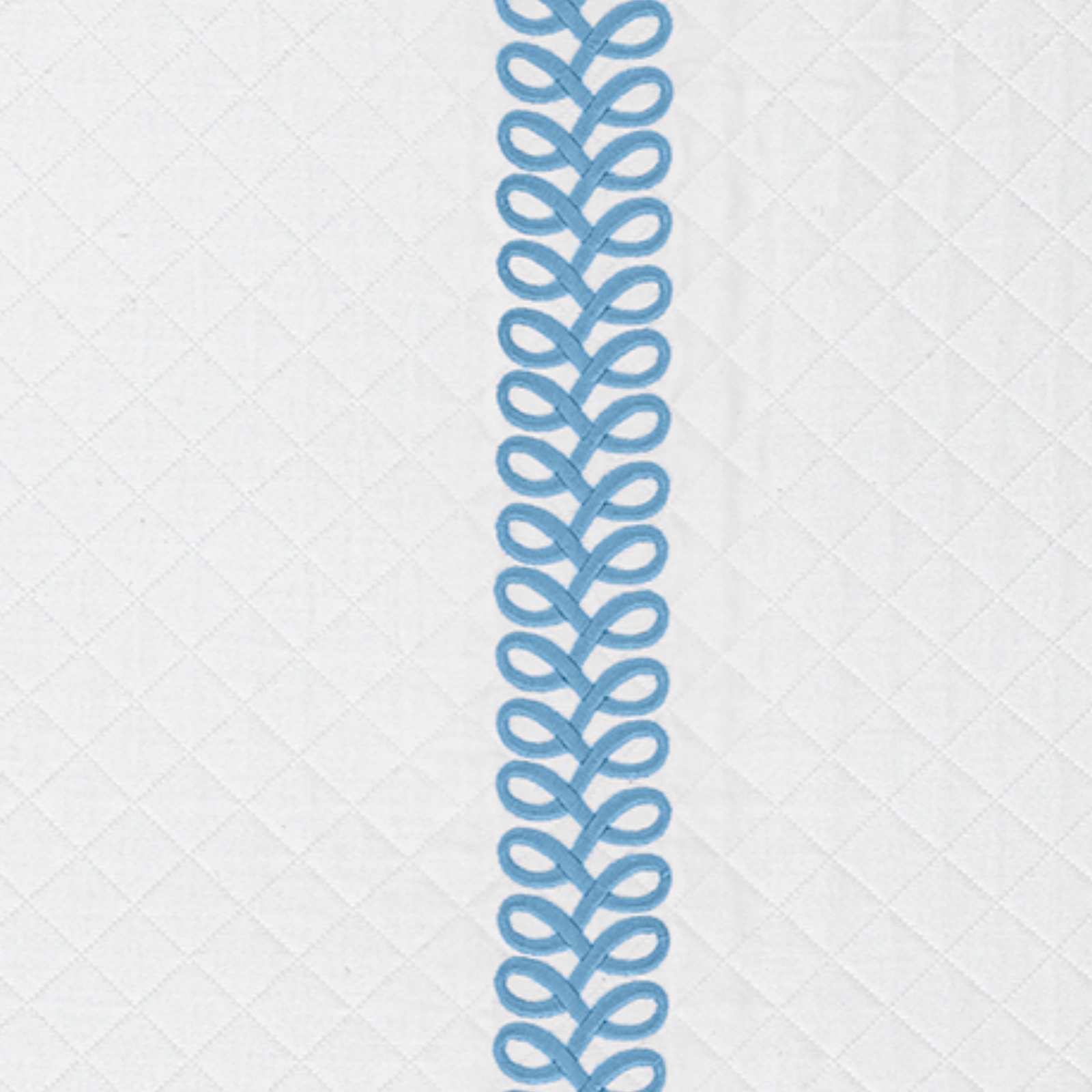 Full Bed Dressed in Matouk Schumacher Astor Braid Matelassé Bedding with Sky Swatch