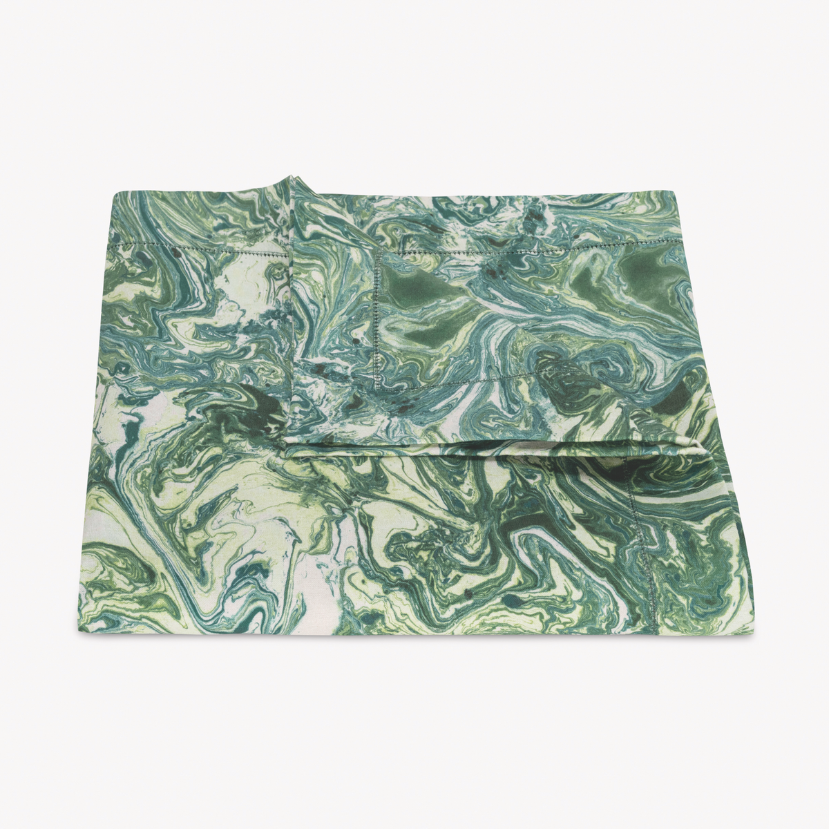 Folded Matouk Schumacher Balthazar Tablecloth in Emerald color