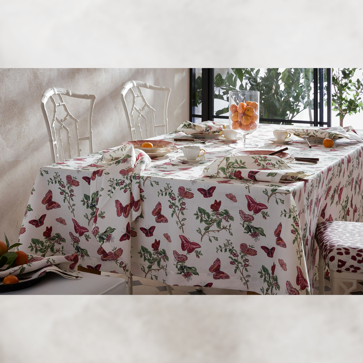 Table with Matouk Schumacher Baudin Butterfly Table Linens in Ruby