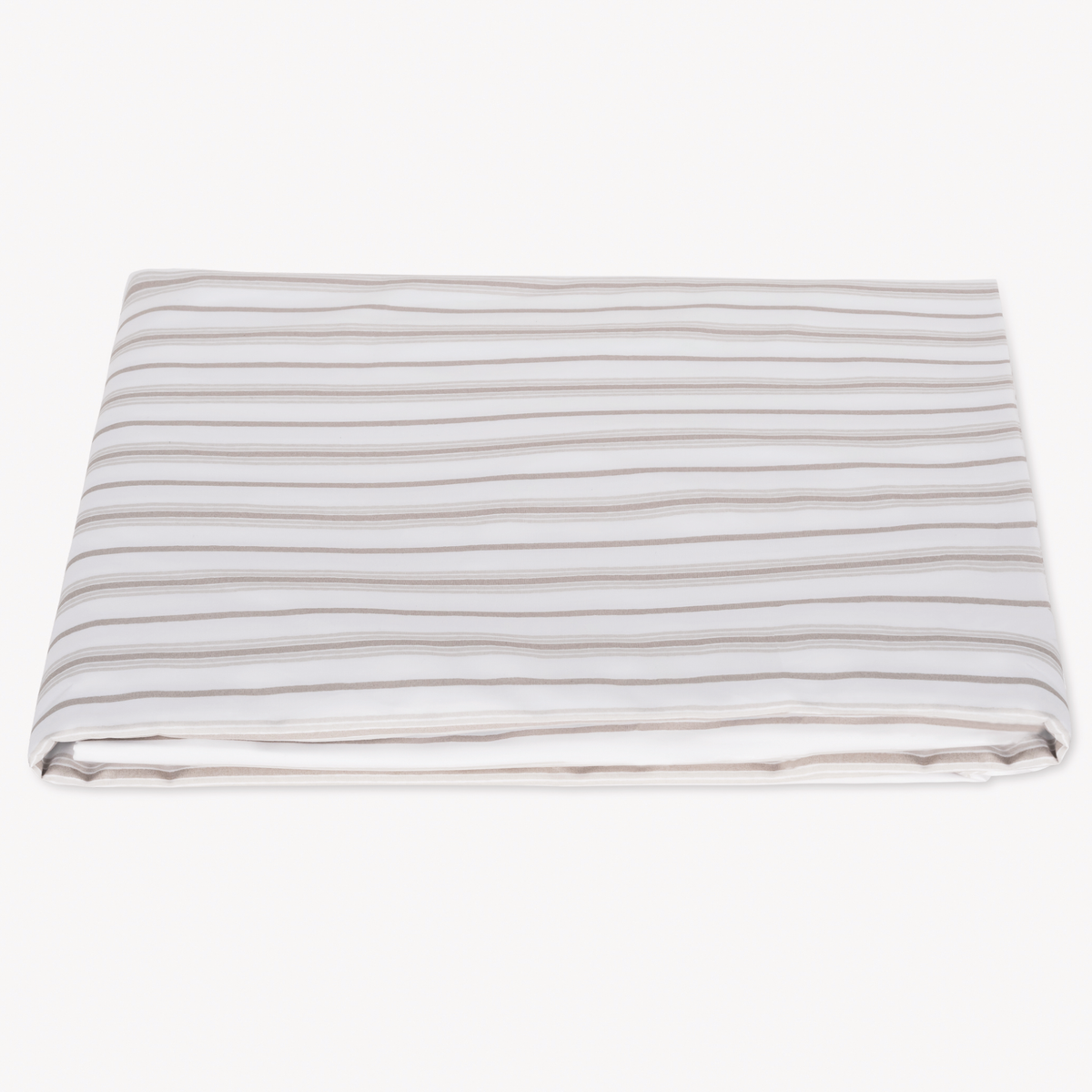 A neatly folded Matouk Calypso Bedding Fitted Sheet with Pebble stripes