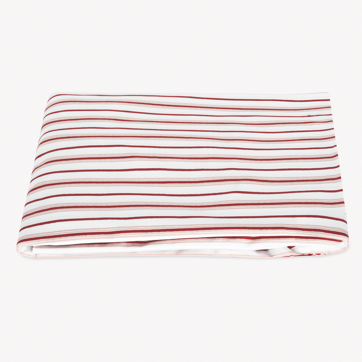 A neatly folded Matouk Calypso Bedding Fitted Sheet with Red Berry stripes