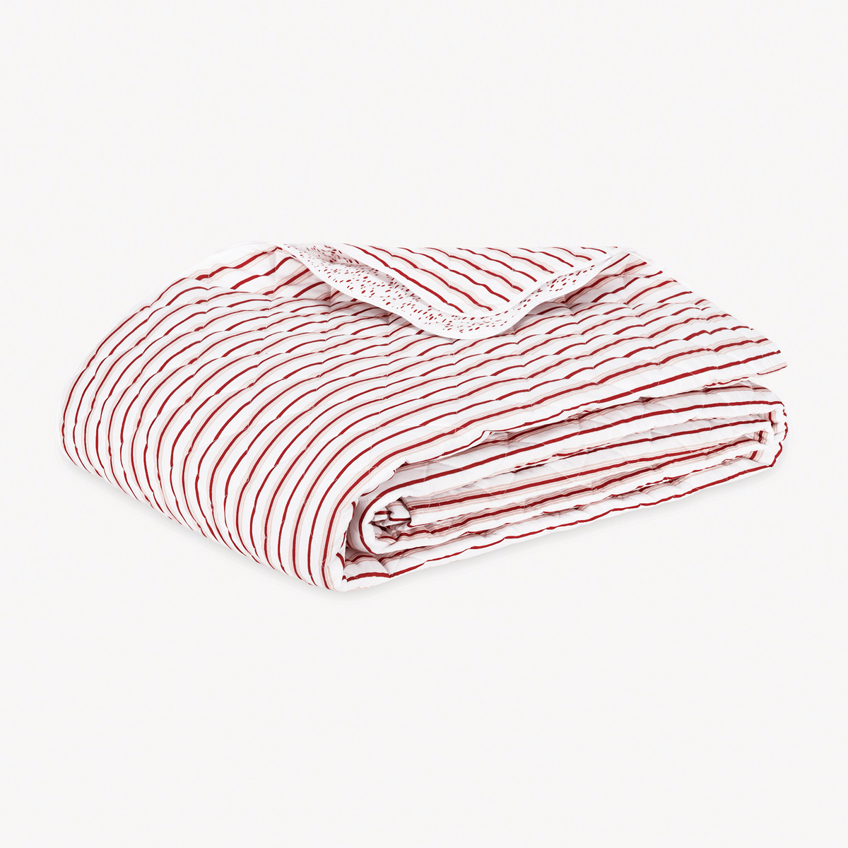 Folded Quilt Coverlet of Matouk Calypso Bedding style in Red Berry Color