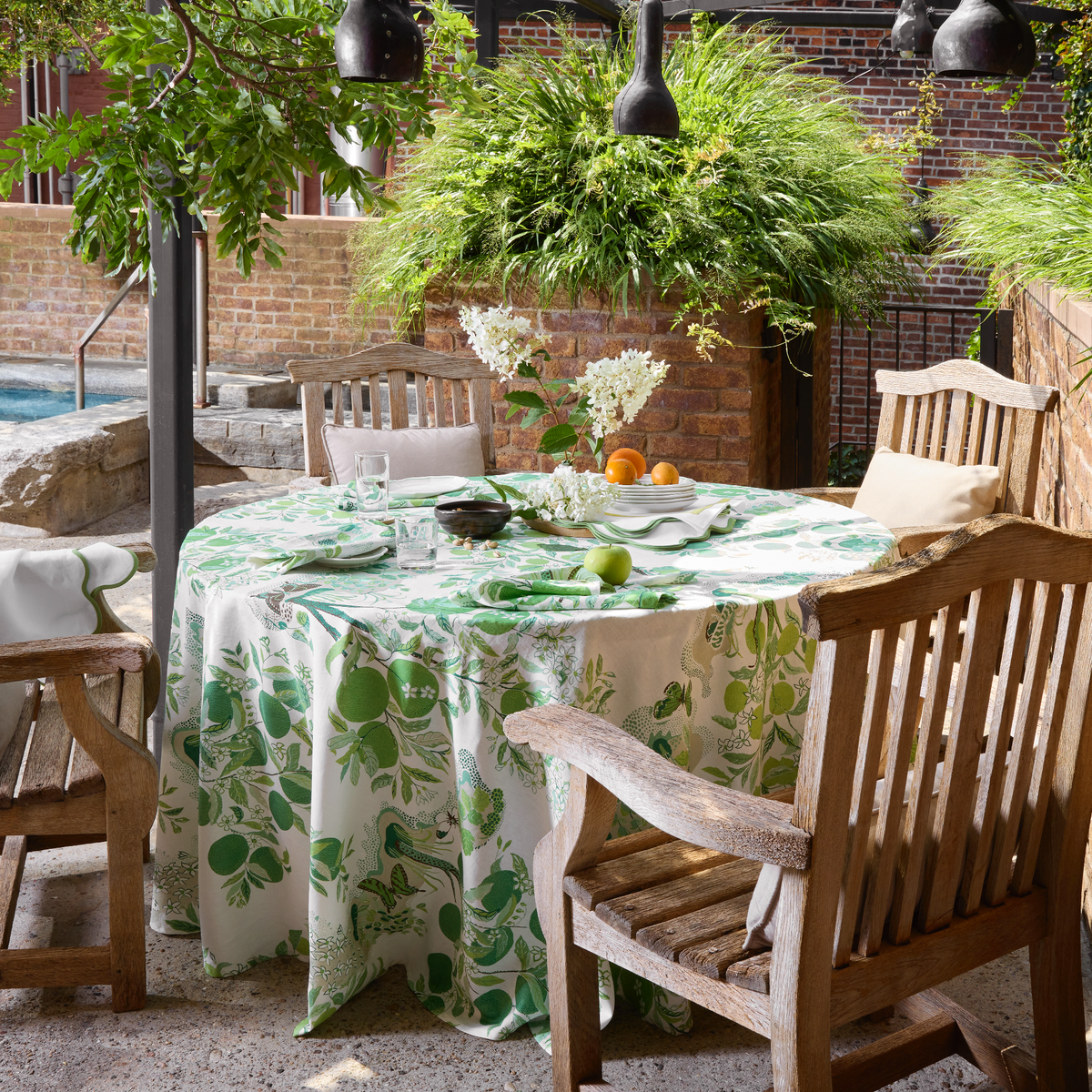 Table Set in Matouk Schumacher Citrus Garden Table Linens in Grass Color