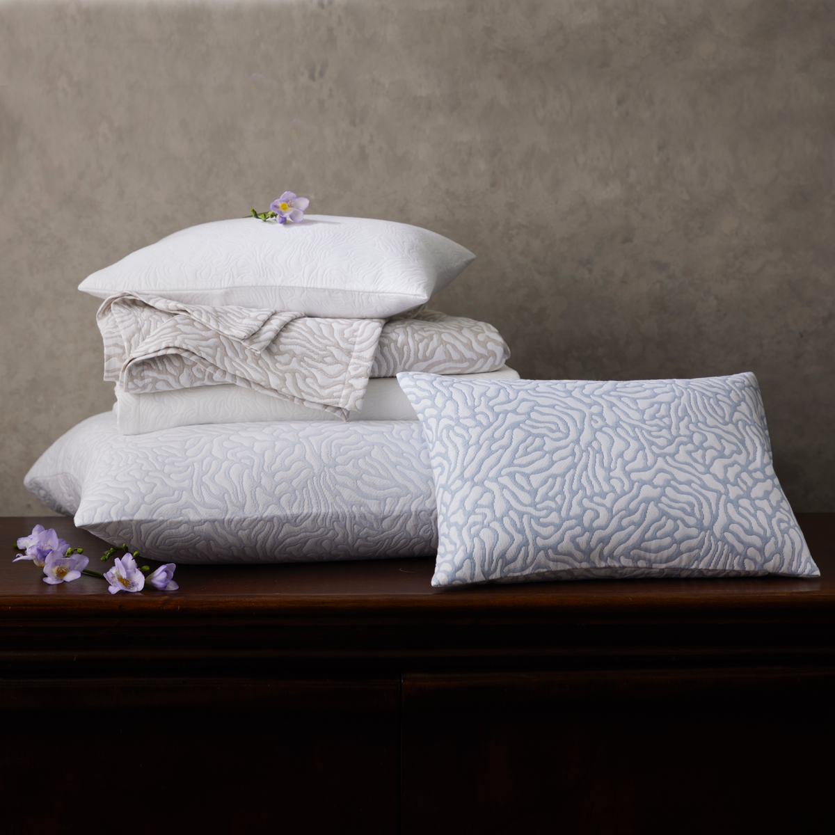 Stack of Coverlet and Shams from Matouk Schumacher Cora Collection