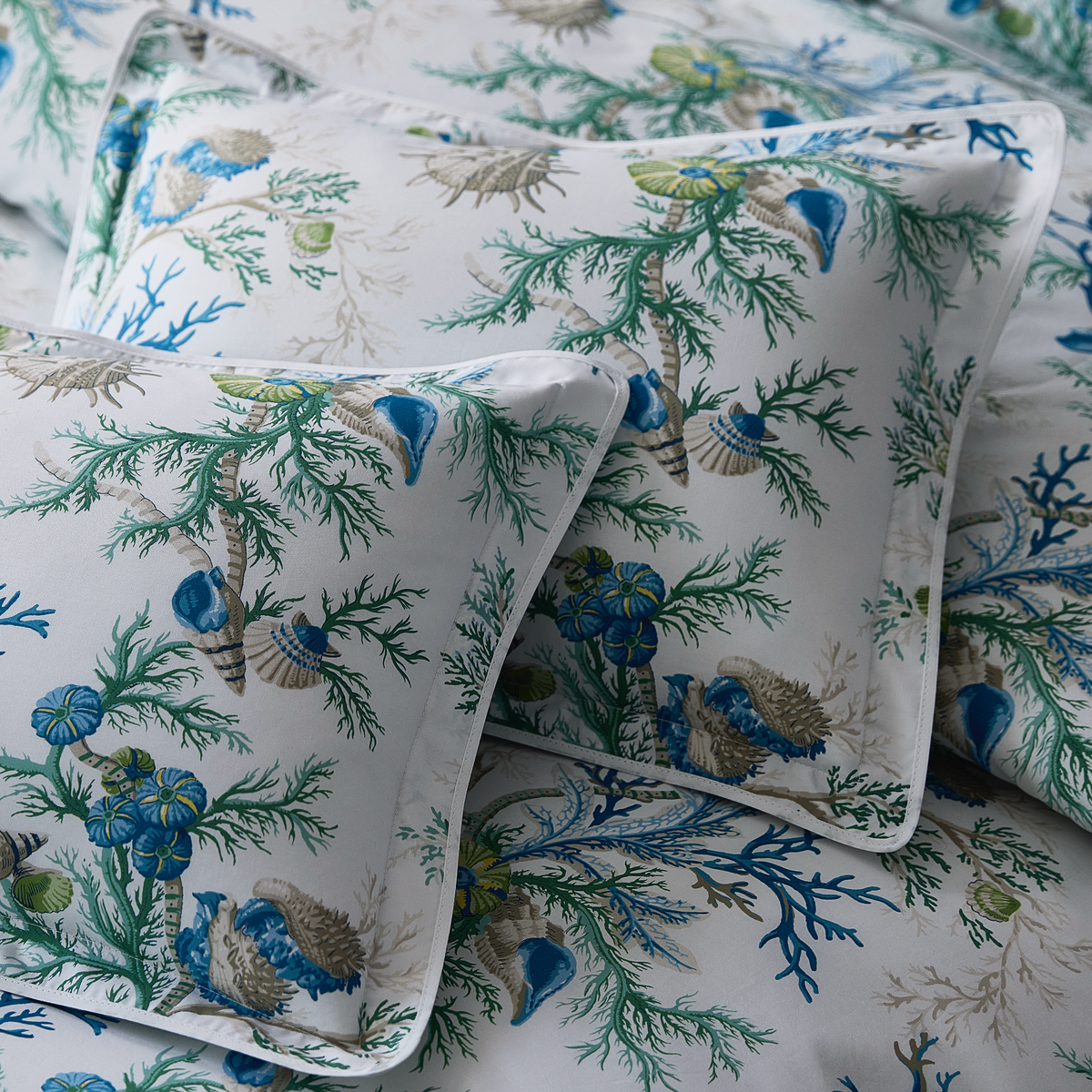 Closeup of Matouk Schumacher Del Tesoro Boudoir Shams in Sea Color