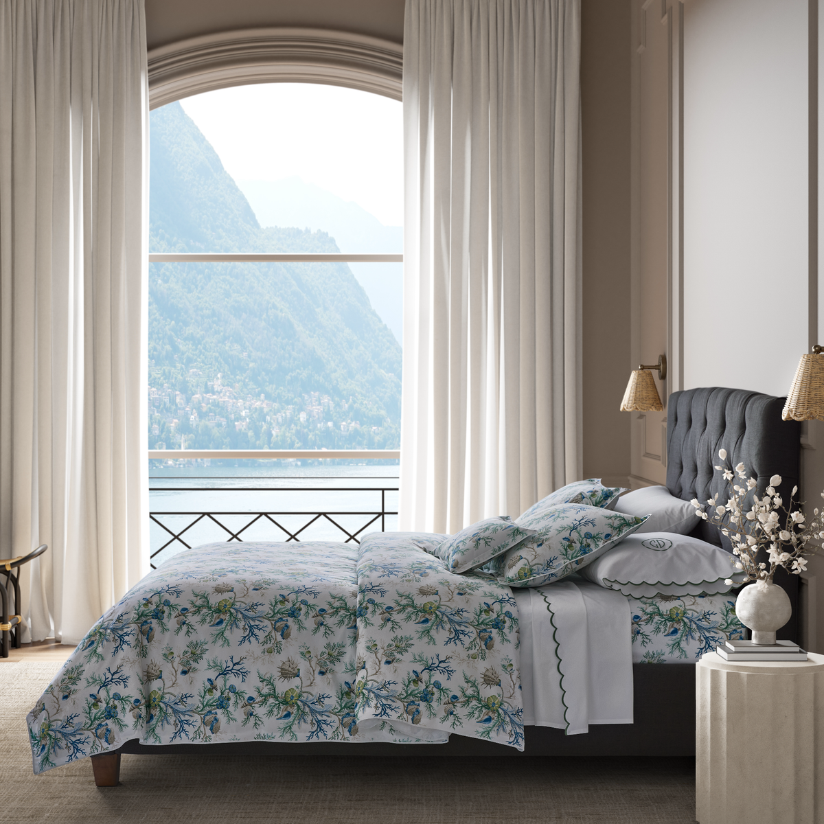 Side View of Bed in Dakota Palm Coordinate with Matouk Schumacher Del Tesoro Bedding in Sea Color