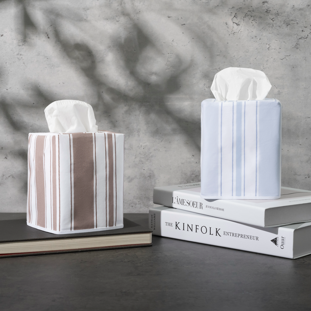 Two colors of Matouk Schumacher Elio Tissue Box Covers
