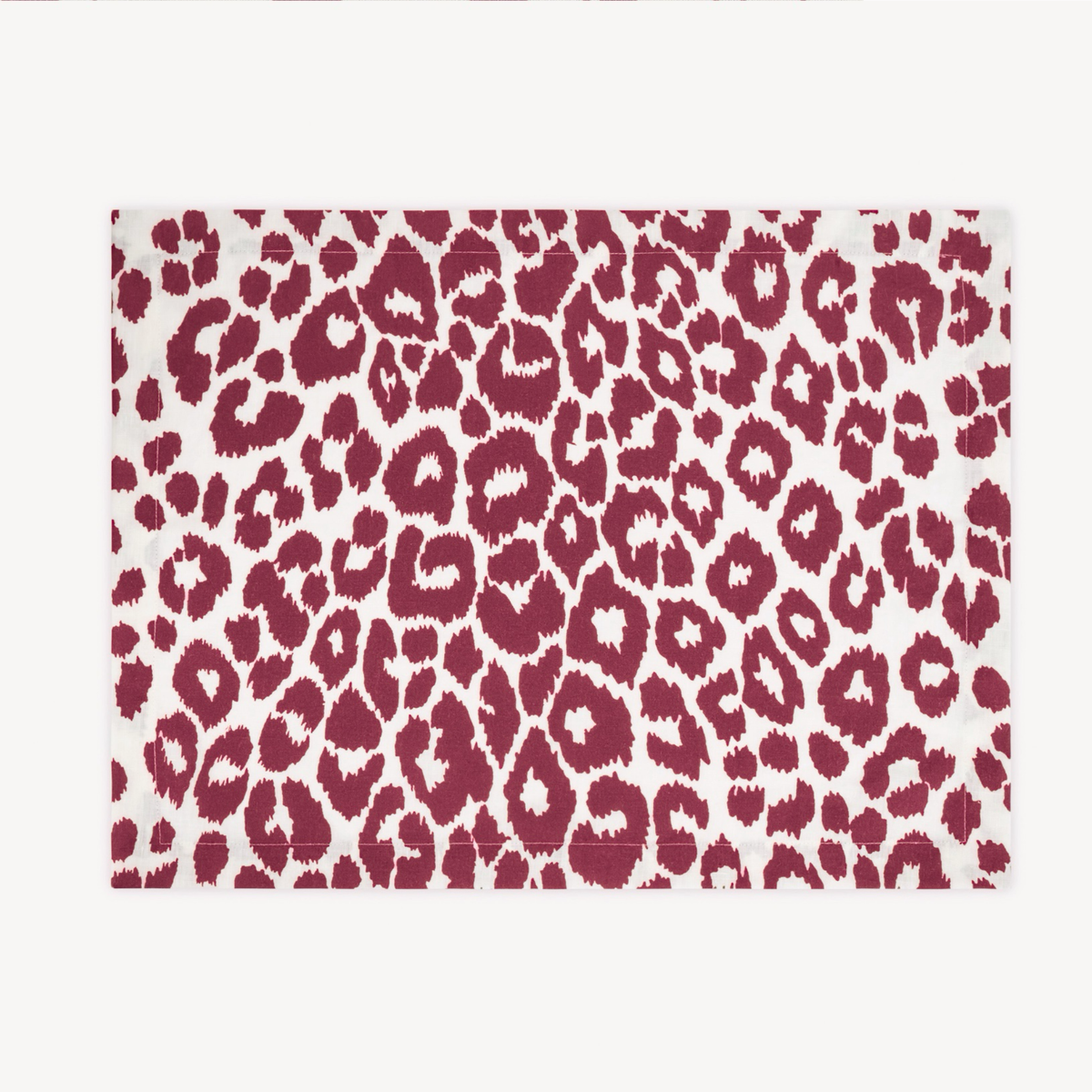 Placemat of Matouk Schumacher Iconic Leopard Table Linens in Crimson