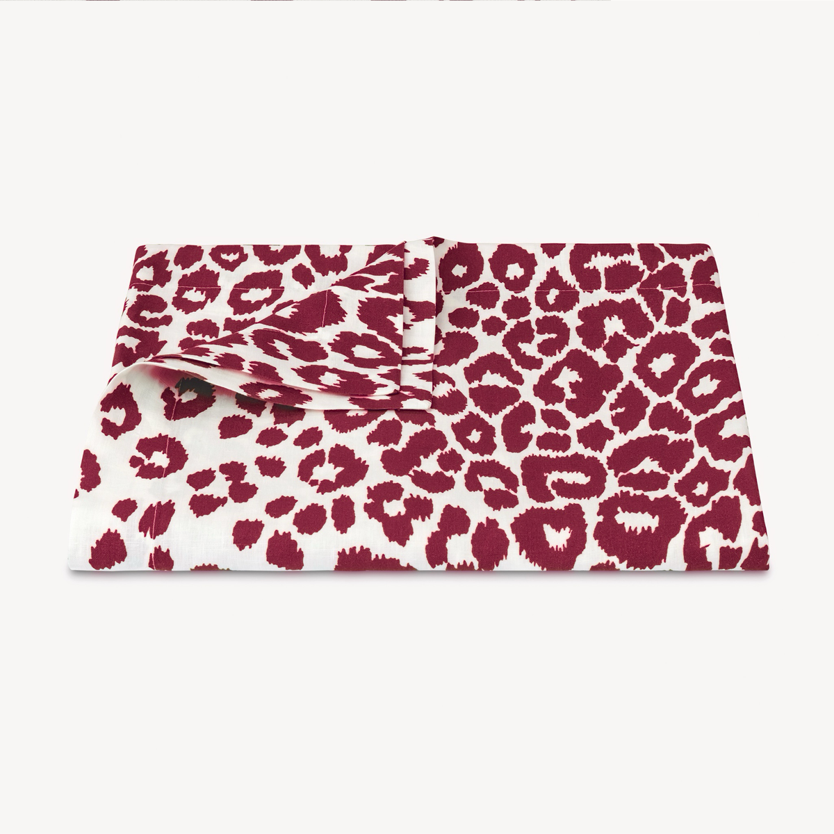 Folded Tablecloth of Matouk Schumacher Iconic Leopard Table Linens in Crimson