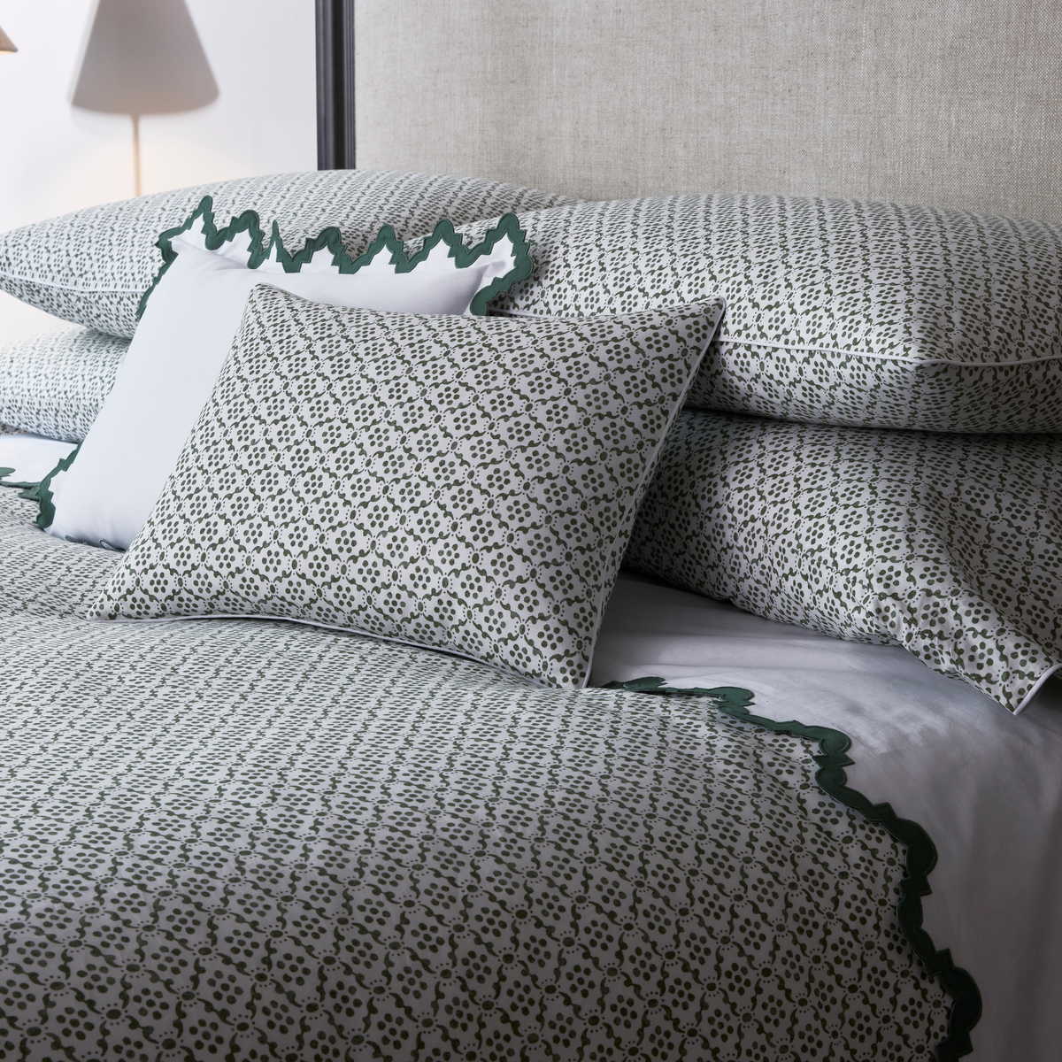 Closeup of Matouk Schumacher Laksha Bedding in Moss color