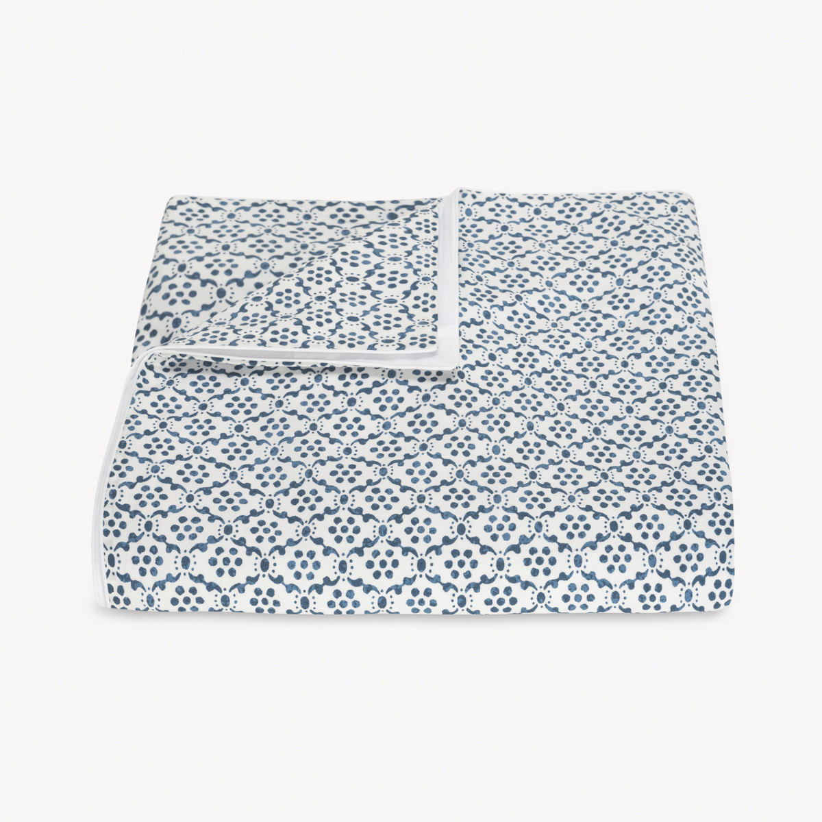 Folded Duvet Cover of Matouk Schumacher Laksha Bedding in Indigo color