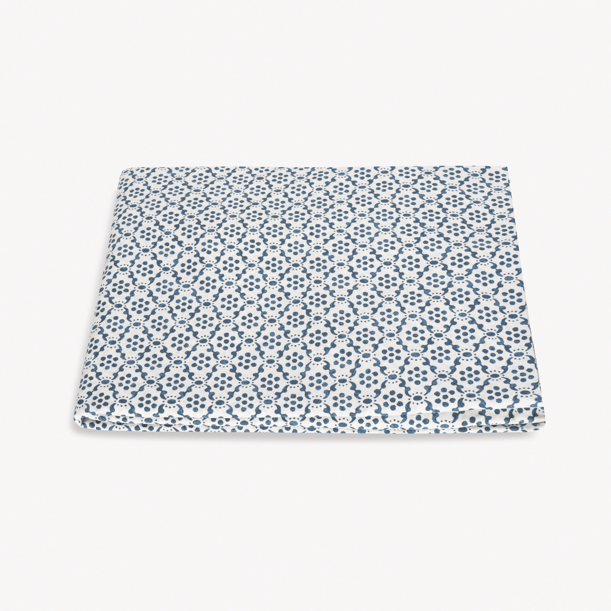Folded Fitted Sheet of Matouk Schumacher Laksha Bedding in Indigo color