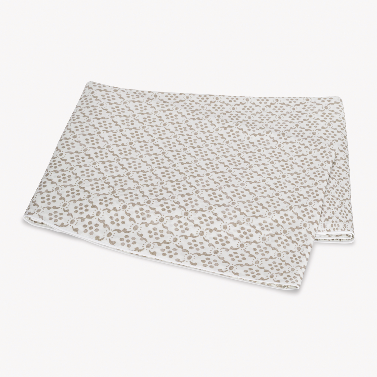 Folded Flat Sheet of Matouk Schumacher Laksha Bedding in Oak color