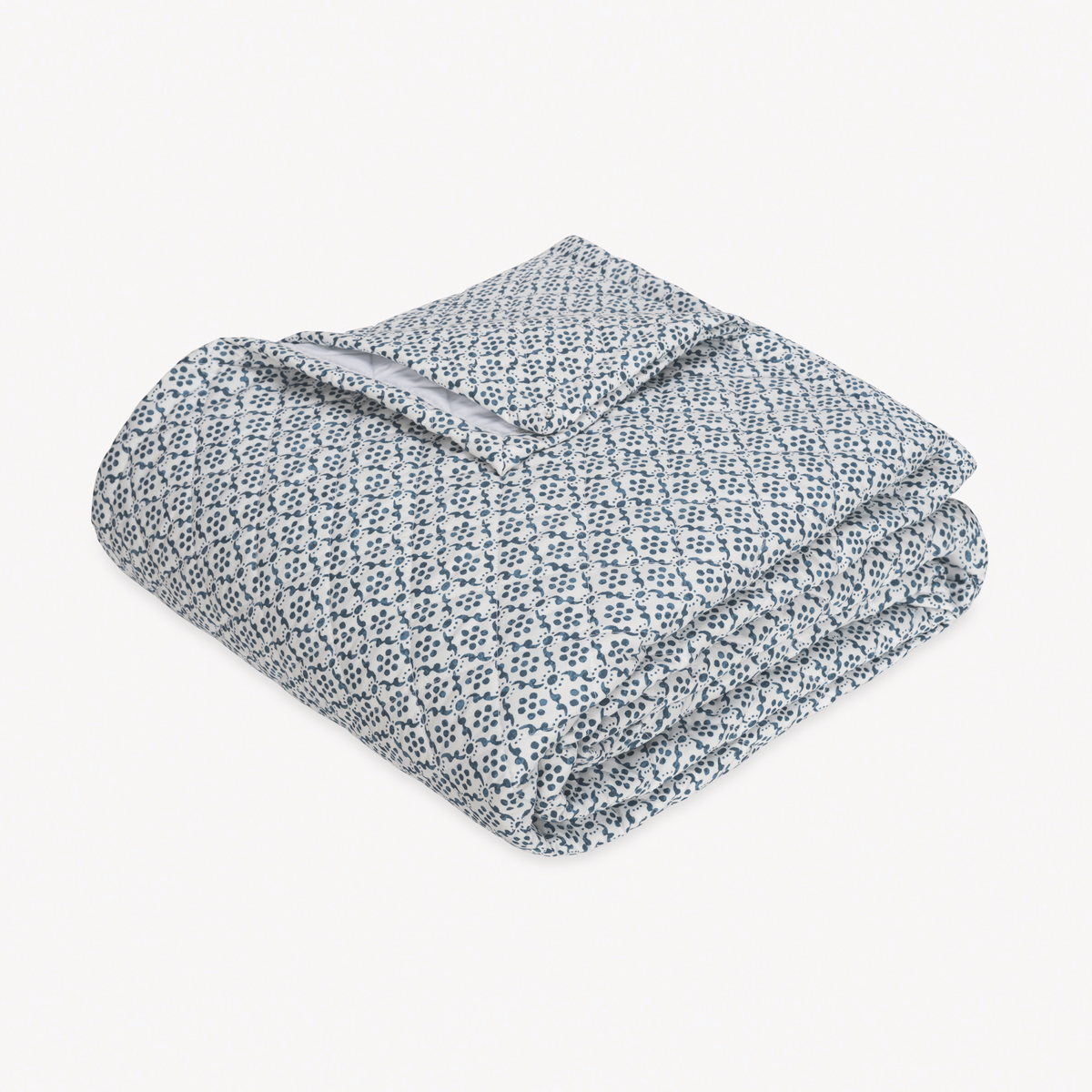 Folded Quilt Coverlet of Matouk Schumacher Laksha Bedding in Indigo color