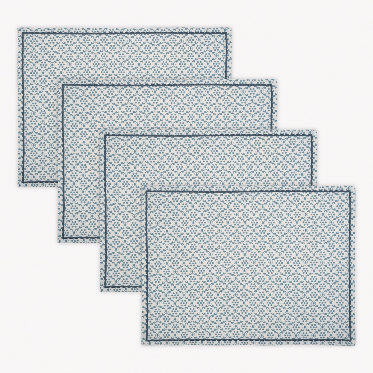 Placemats of Matouk Schumacher Laksha Table Linens in Lapis color