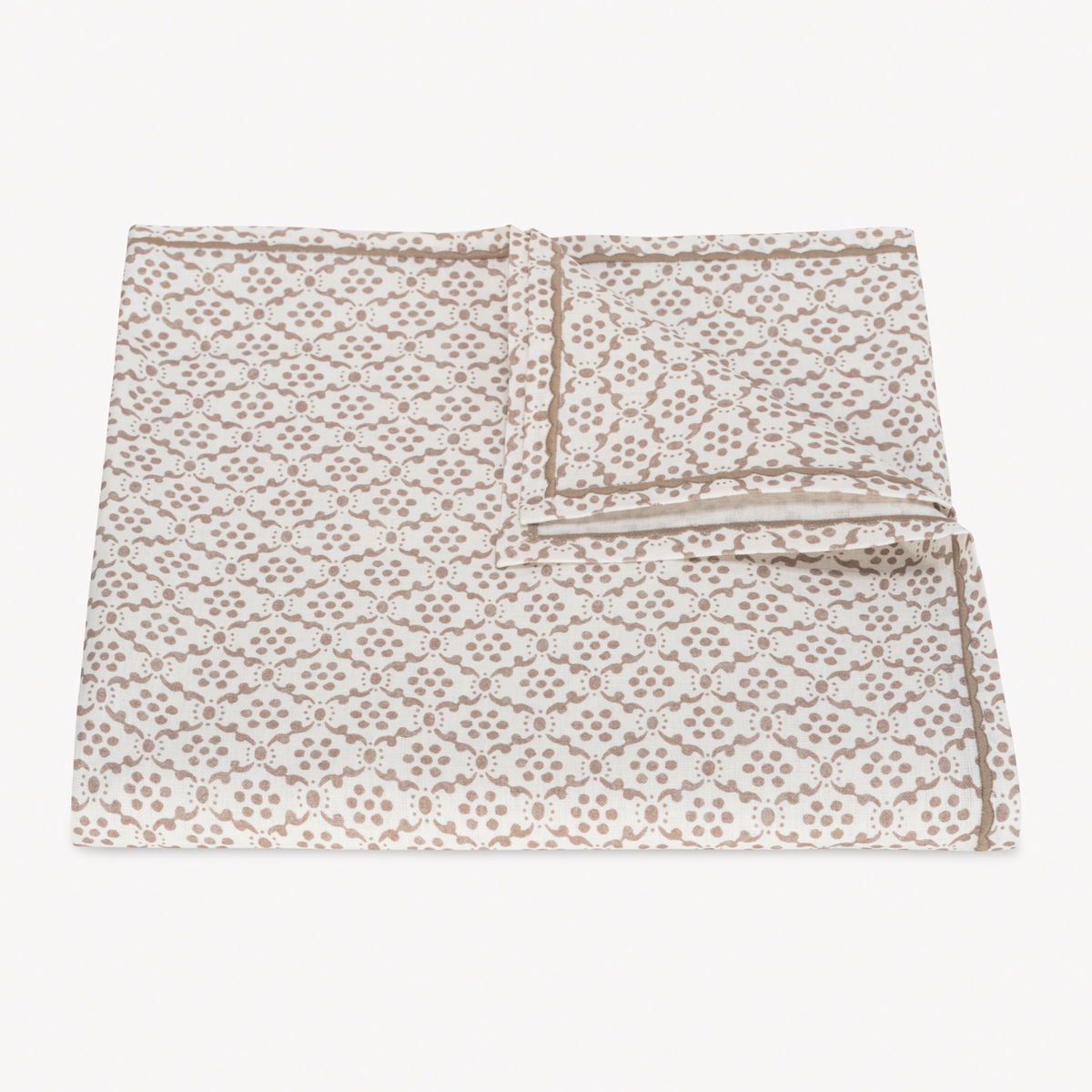 Folded Tablecloth of Matouk Schumacher Laksha Table Linens in Oak color