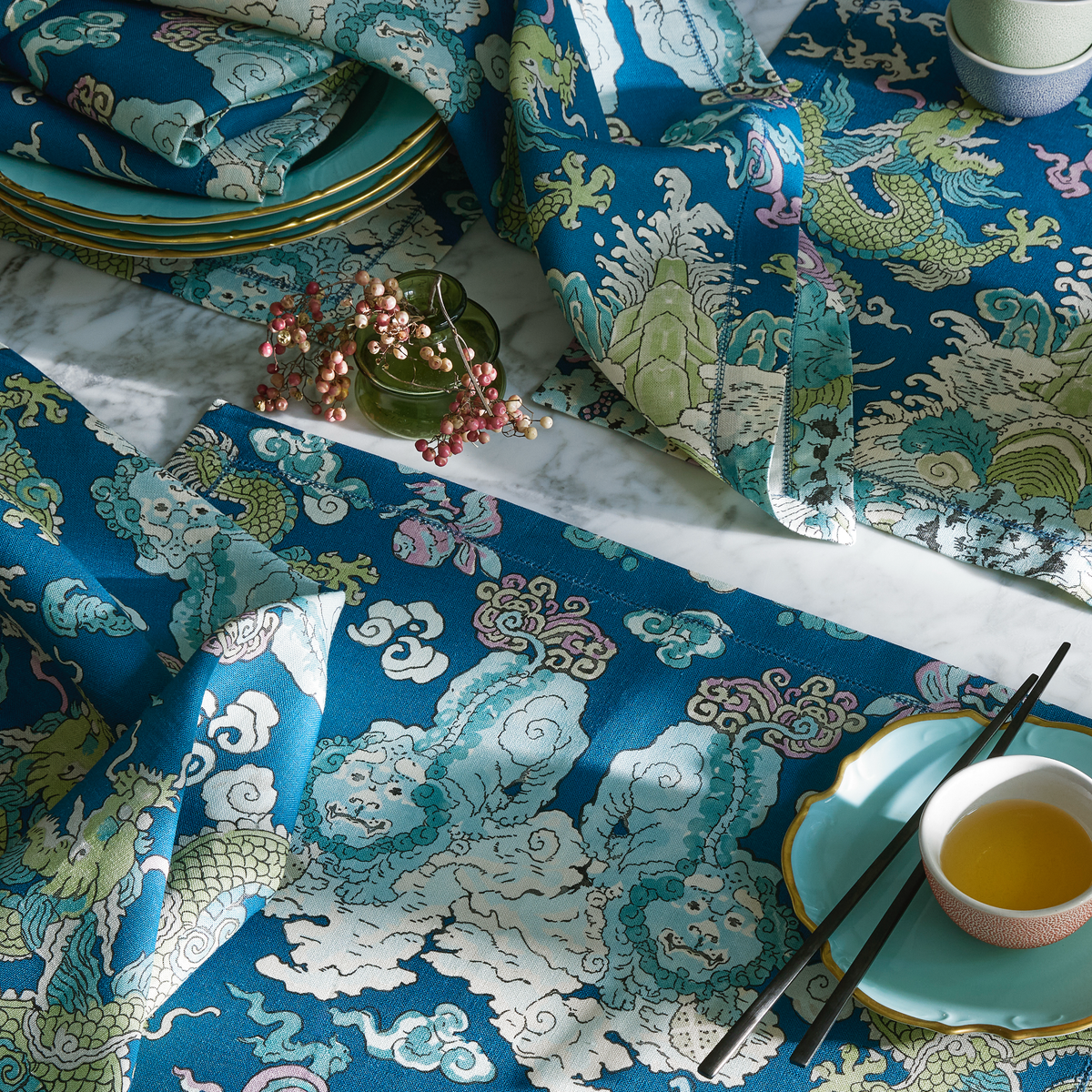 Closeup of Matouk Schumacher Magic Mountain Table Linens in Aquarius