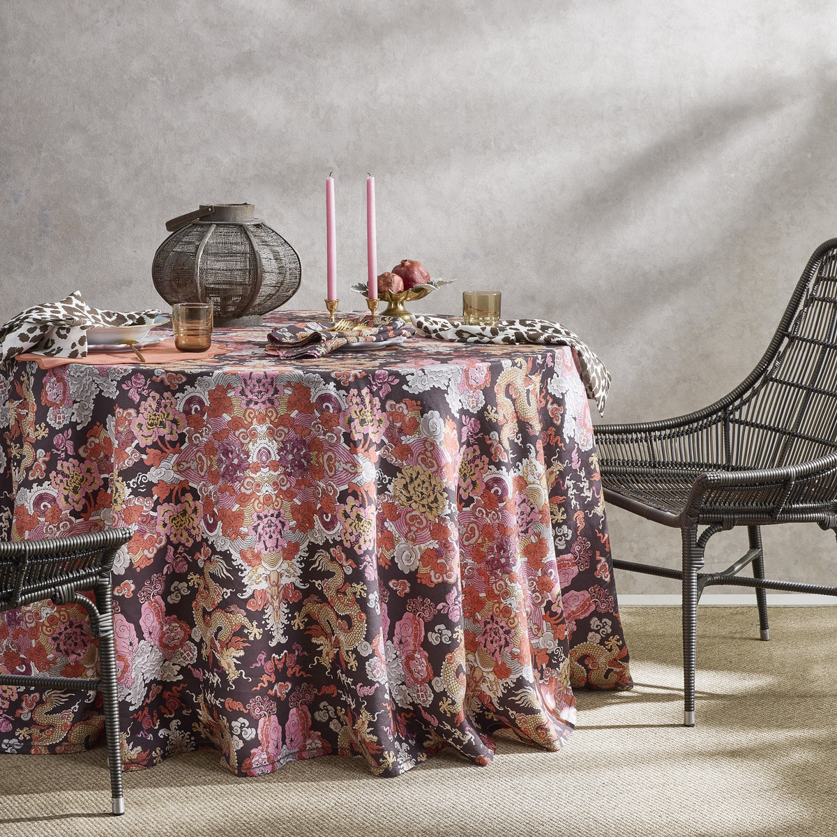 Lifestyle Shot of Matouk Schumacher Magic Mountain Table Linens in Color Chocolate Persimmon
