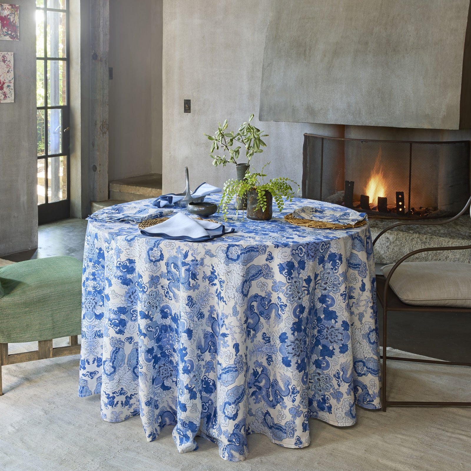 Lifestyle Shot of Matouk Schumacher Magic Mountain Table Linens in Color Porcelain Blue