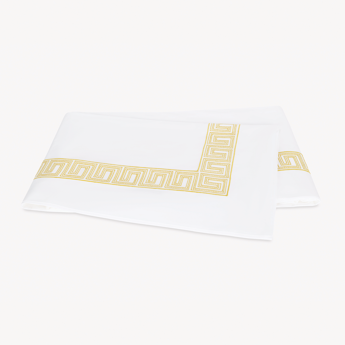 Folded Flat Sheet of Matouk Schumacher Ophelia Bedding in Lemon