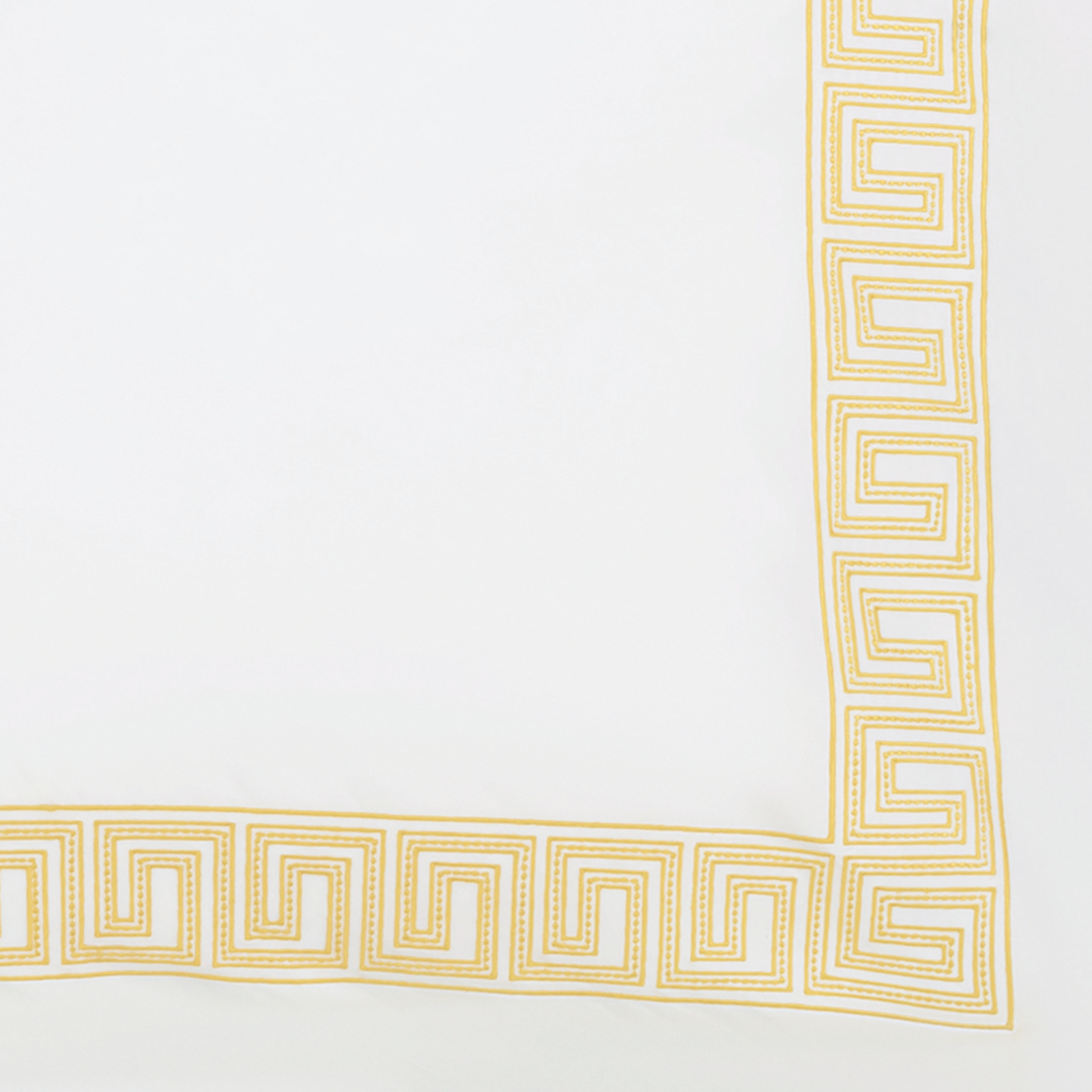 Bed in Matouk Schumacher Ophelia Bedding with Lemon Swatch