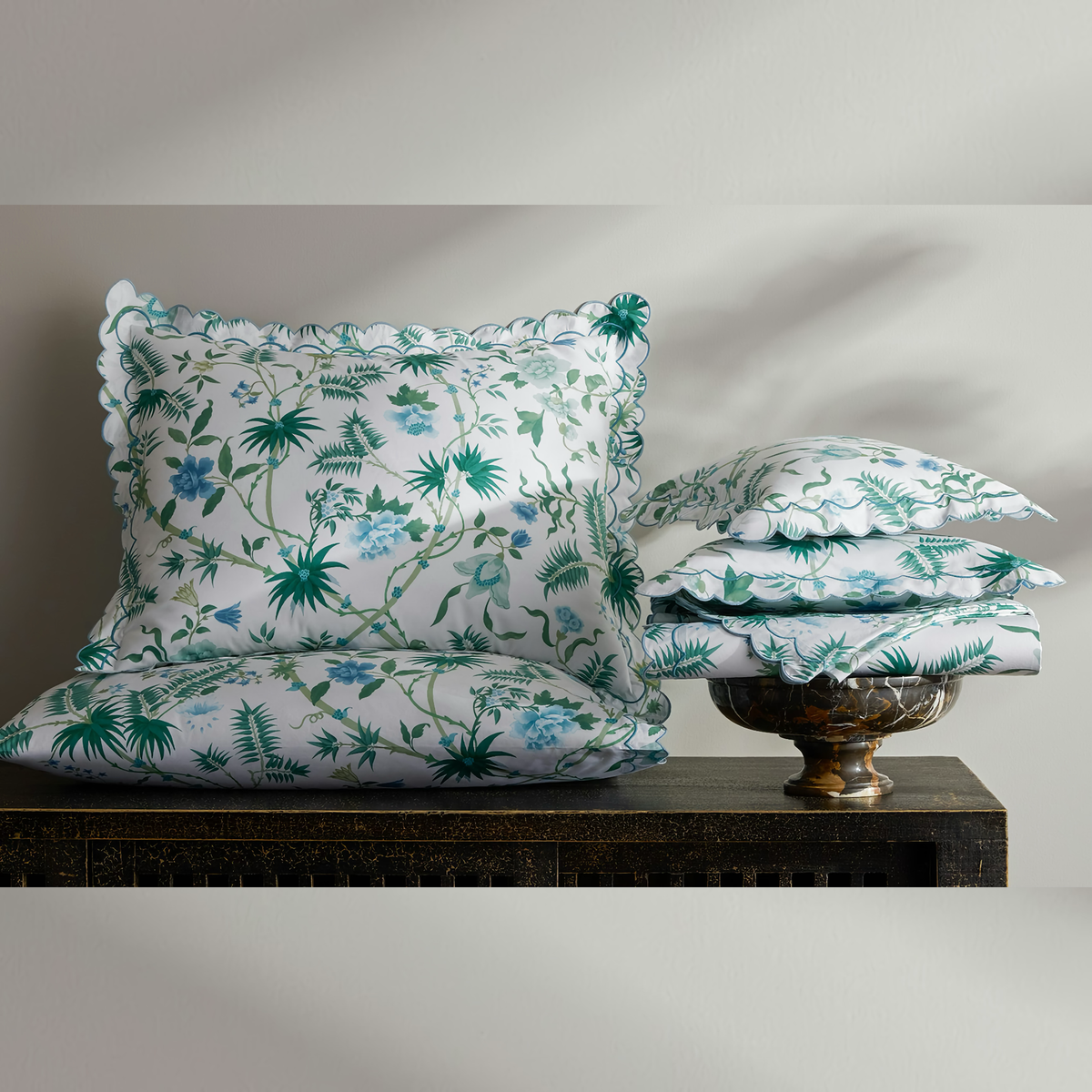 Stack of Matouk Schumacher Palmyra Bedding in Emerald