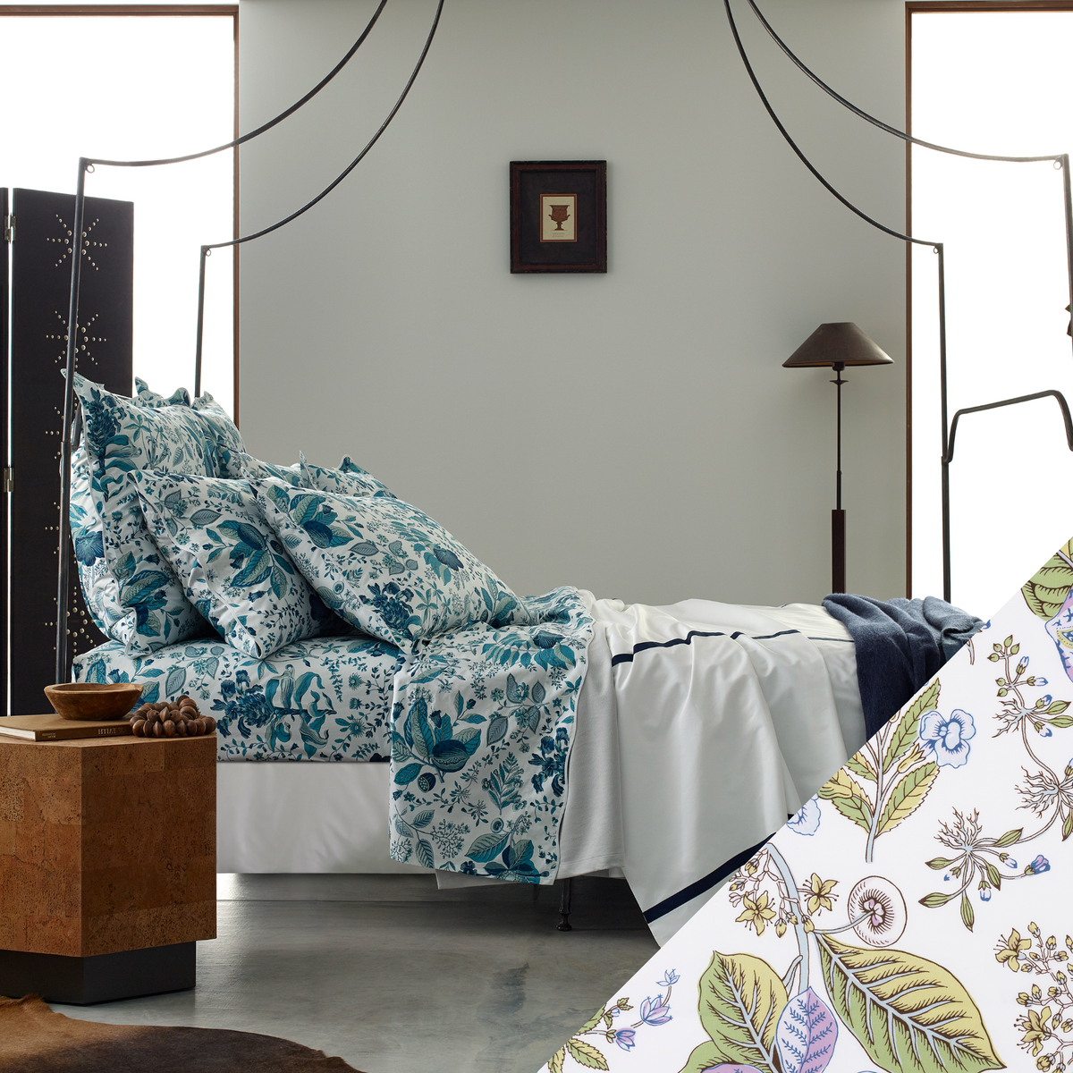 A bed with Lilac Matouk Schumacher Pomegranate Bedding Swatch, in a modern room with minimal decor