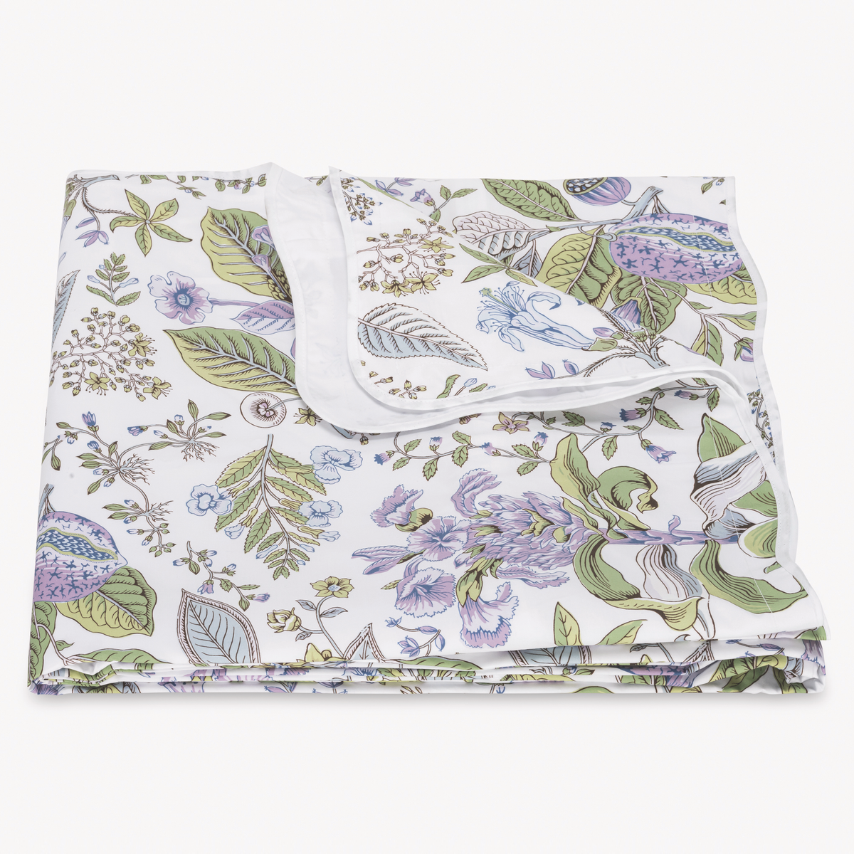 A folded Egyptian cotton percale Duvet Cover in Lilac Schumacher Matouk pomegranate bed design