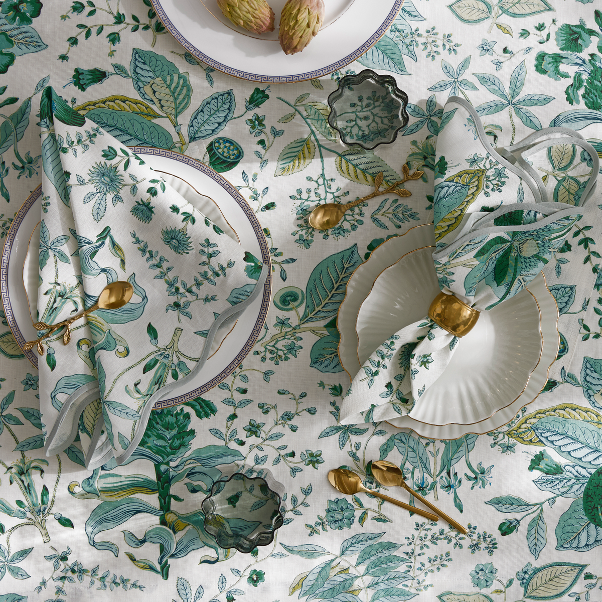 Top View of Matouk Schumacher Pomegranate Table Linens in Emerald