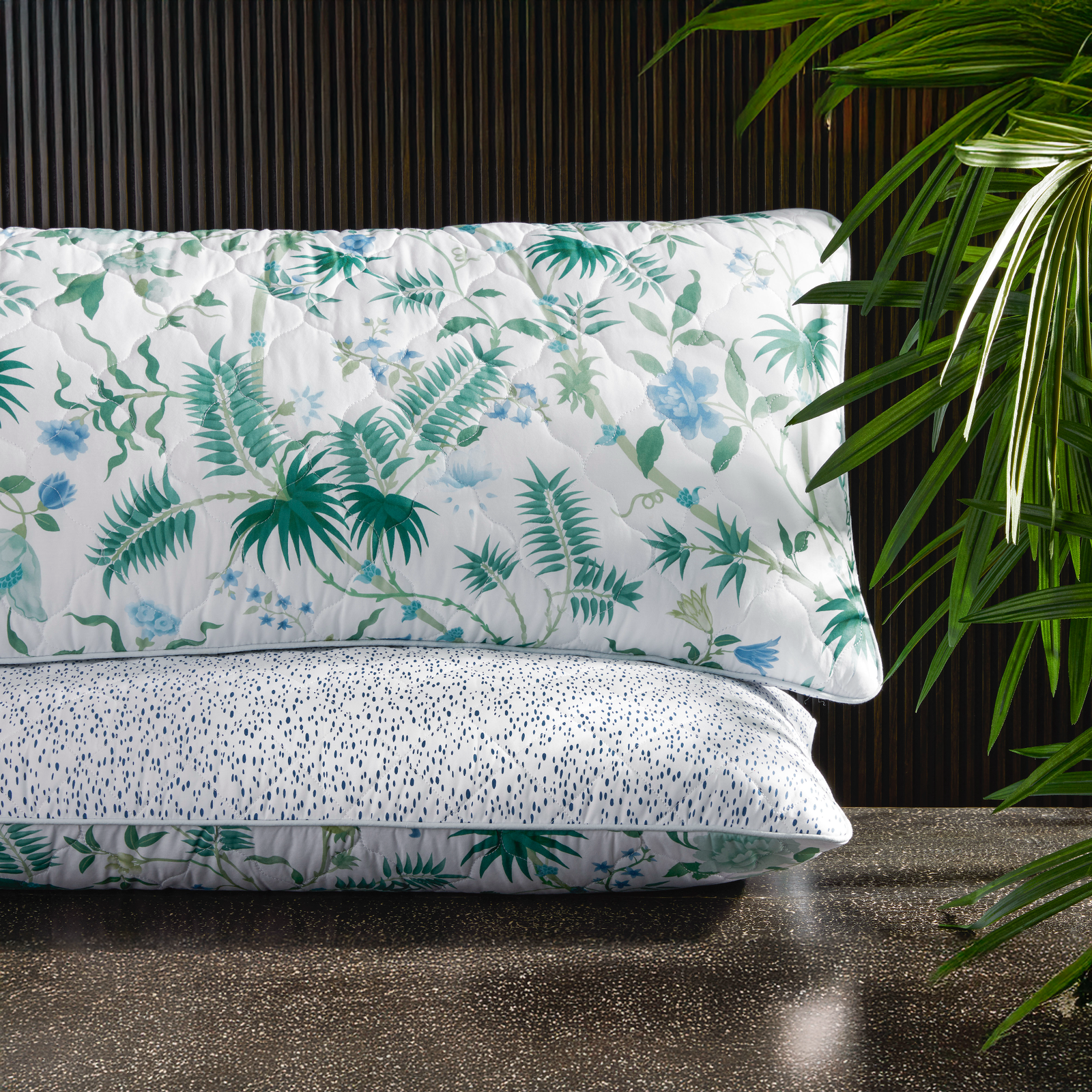 Stack of Matouk Schumacher Reversible Pillow Collection in Plamyra Emerald/Celine Blue