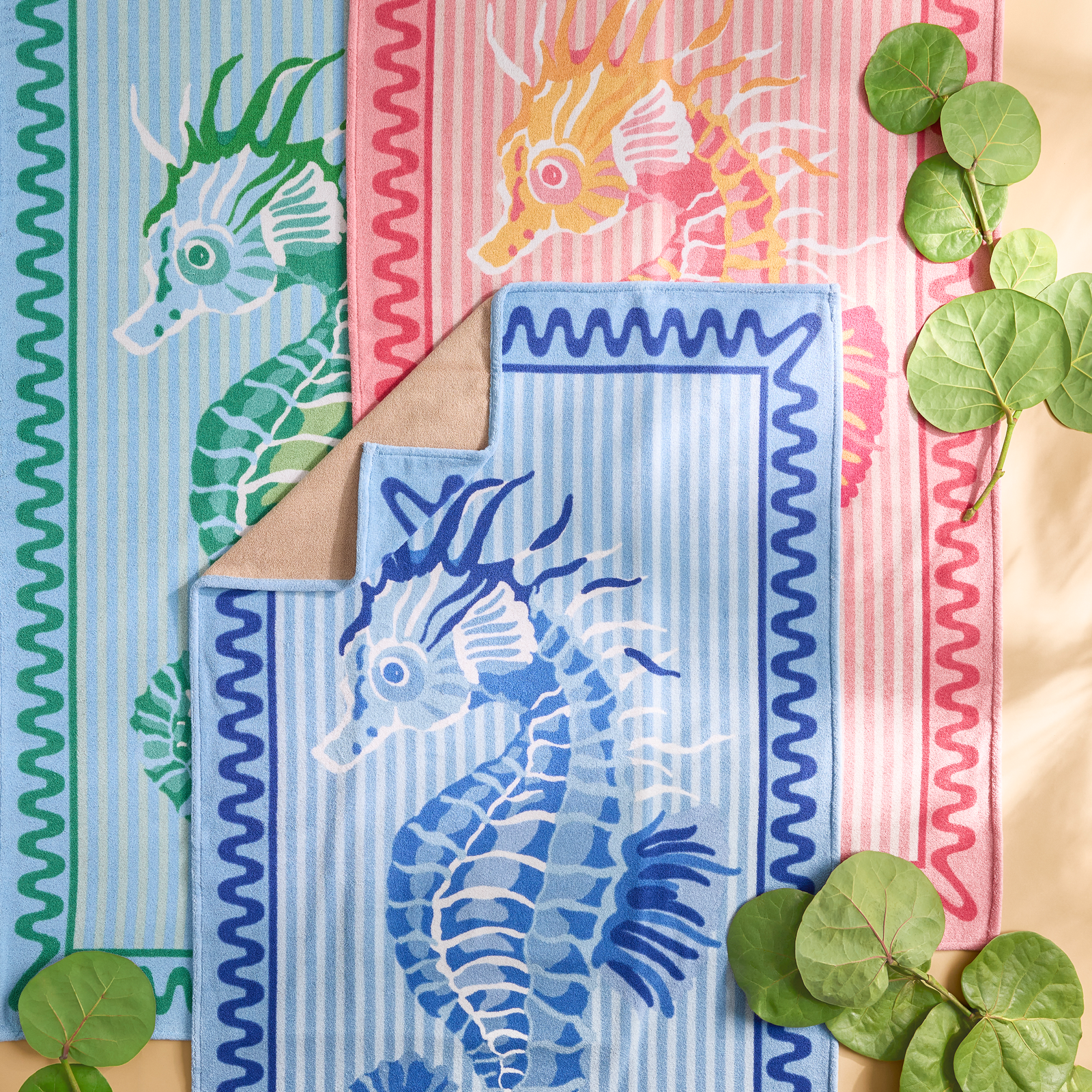 Lifestyle Image of Fabric Sample of Matouk Schumacher Seahorse Beach Towels