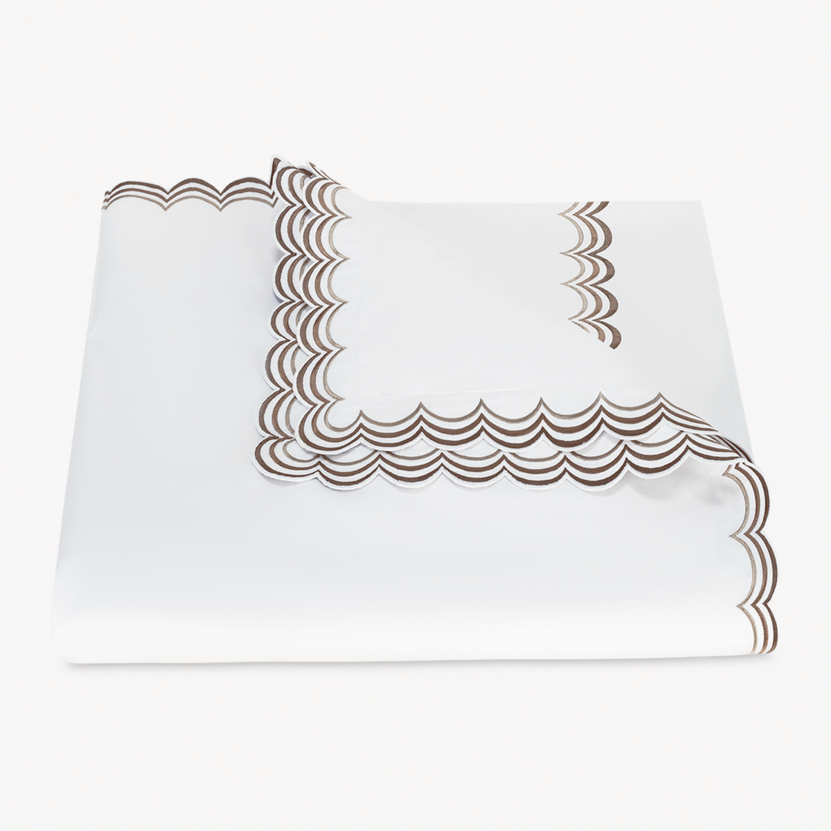 Folded Duvet Cover of Matouk Stella Bedding in Mocha