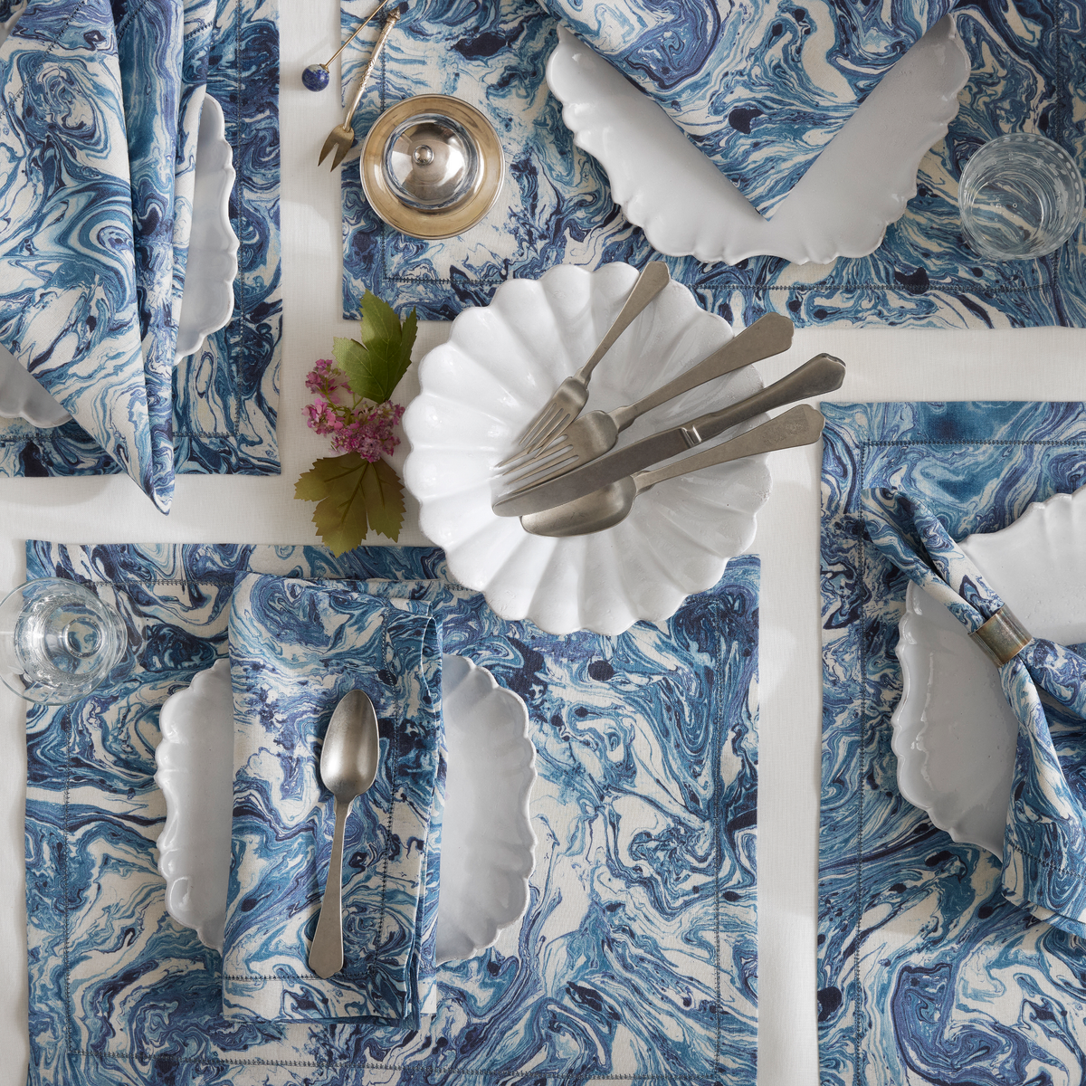 Closeup of Matouk Schumacher Balthazar Table collection in Lapis color