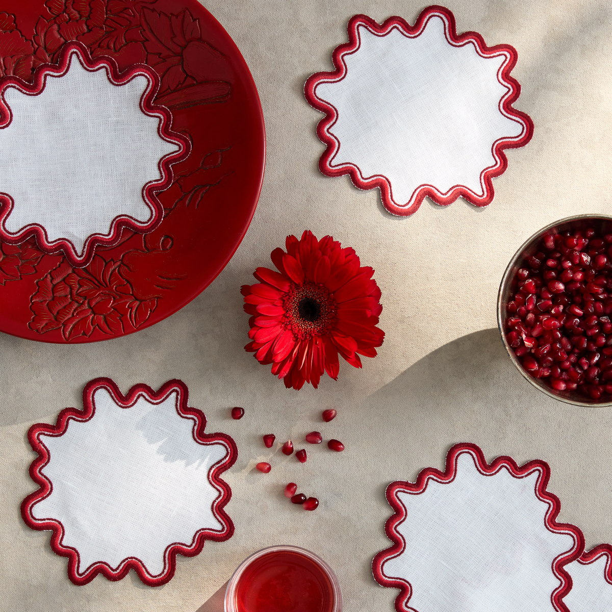 Scarlet Color of Matouk Wave Cocktail Napkins on tabletop